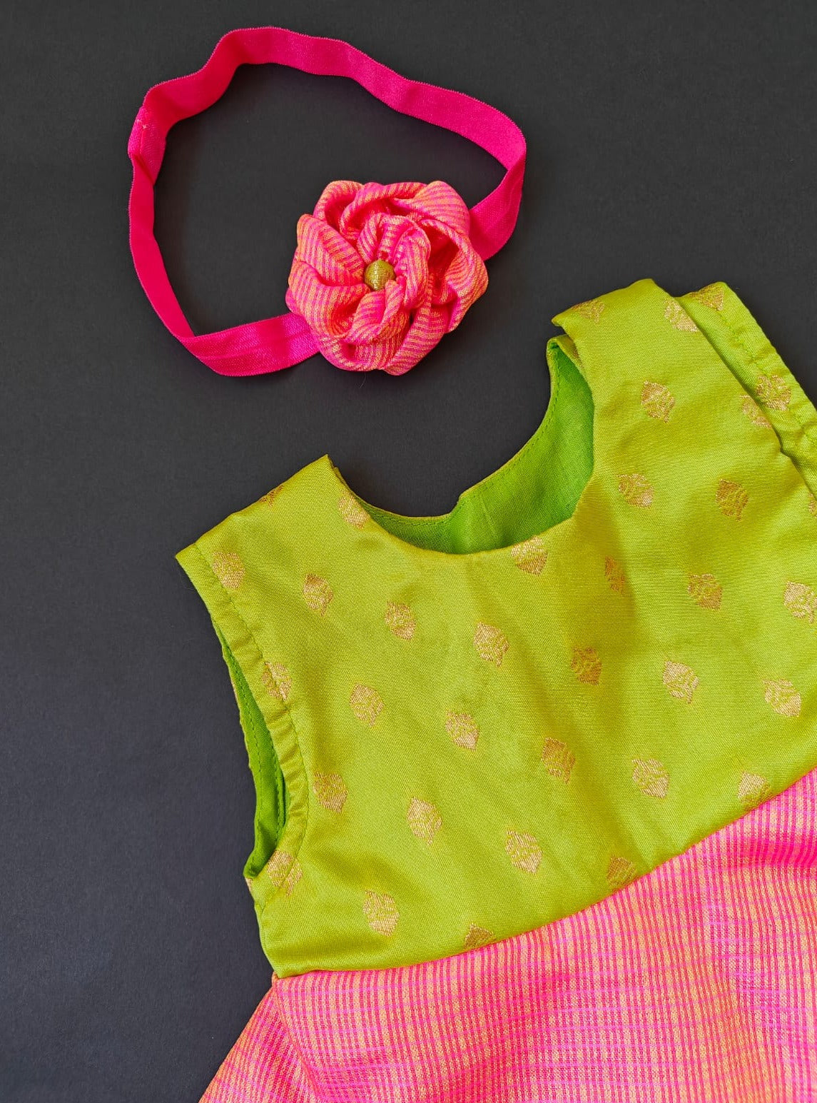 Lime Green soft brocade & pink front open layered dress with bloomer,headband,booties for a newborn baby girl.It's the perfect outfit for your baby's naming ceremony,naamkaran or annaprashan ceremony.Traditional dress for Noolukettu Ceremony,Pachavi Puja,cradle ceremony,Rice Ceremony,Chatti Puja etc. Apt gifting idea