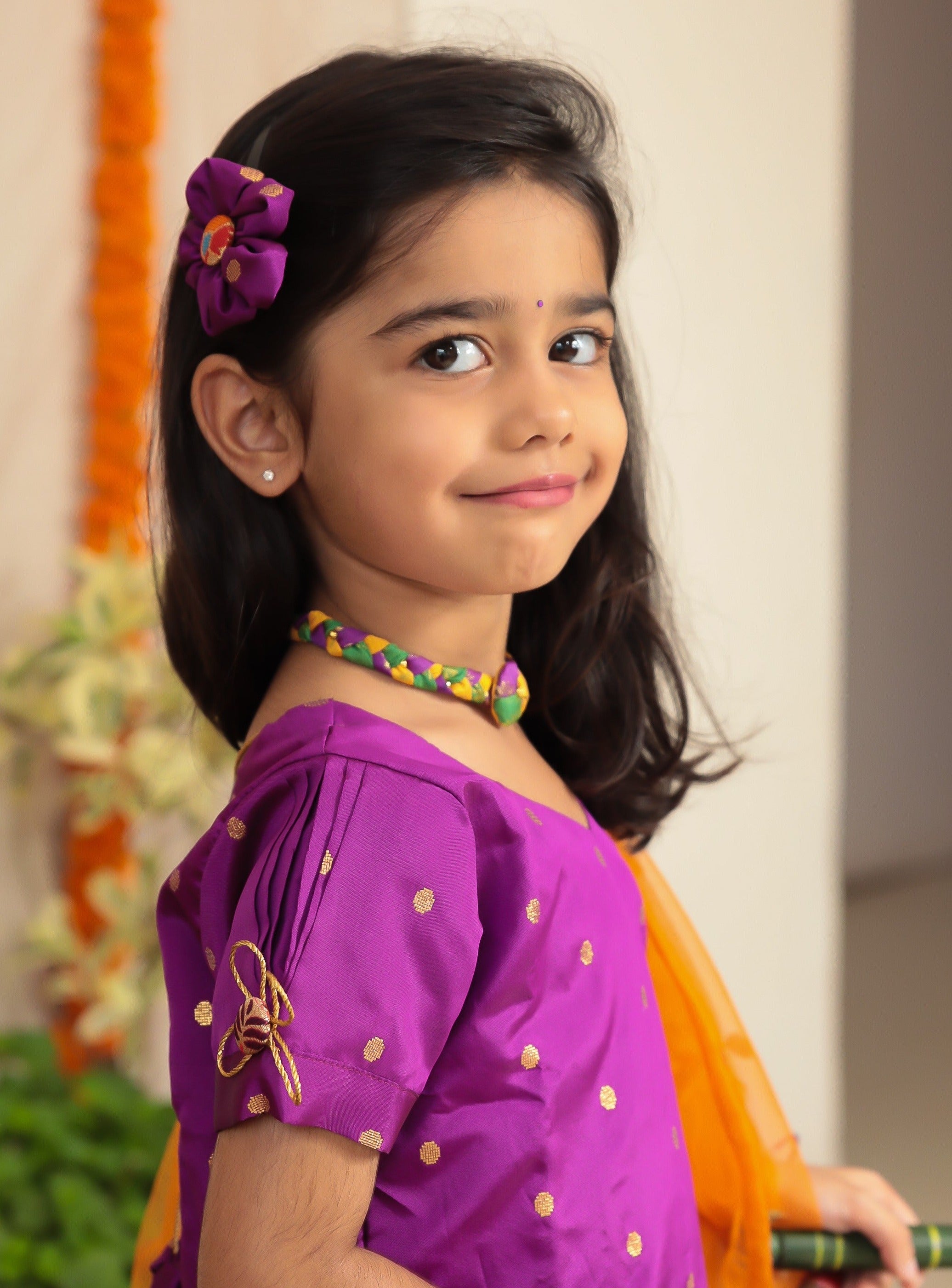 Purple Taffeta Silk Ghagra Choli with a broad statement Paithani Border for girl.Let your princess be as comfortable as in her casuals with carefully designed & crafted Comfort Ethnic Wear by Soyara Ethnics.Keep her fashion quotient high with timeless patterns, vibrant combinations and royal textiles.