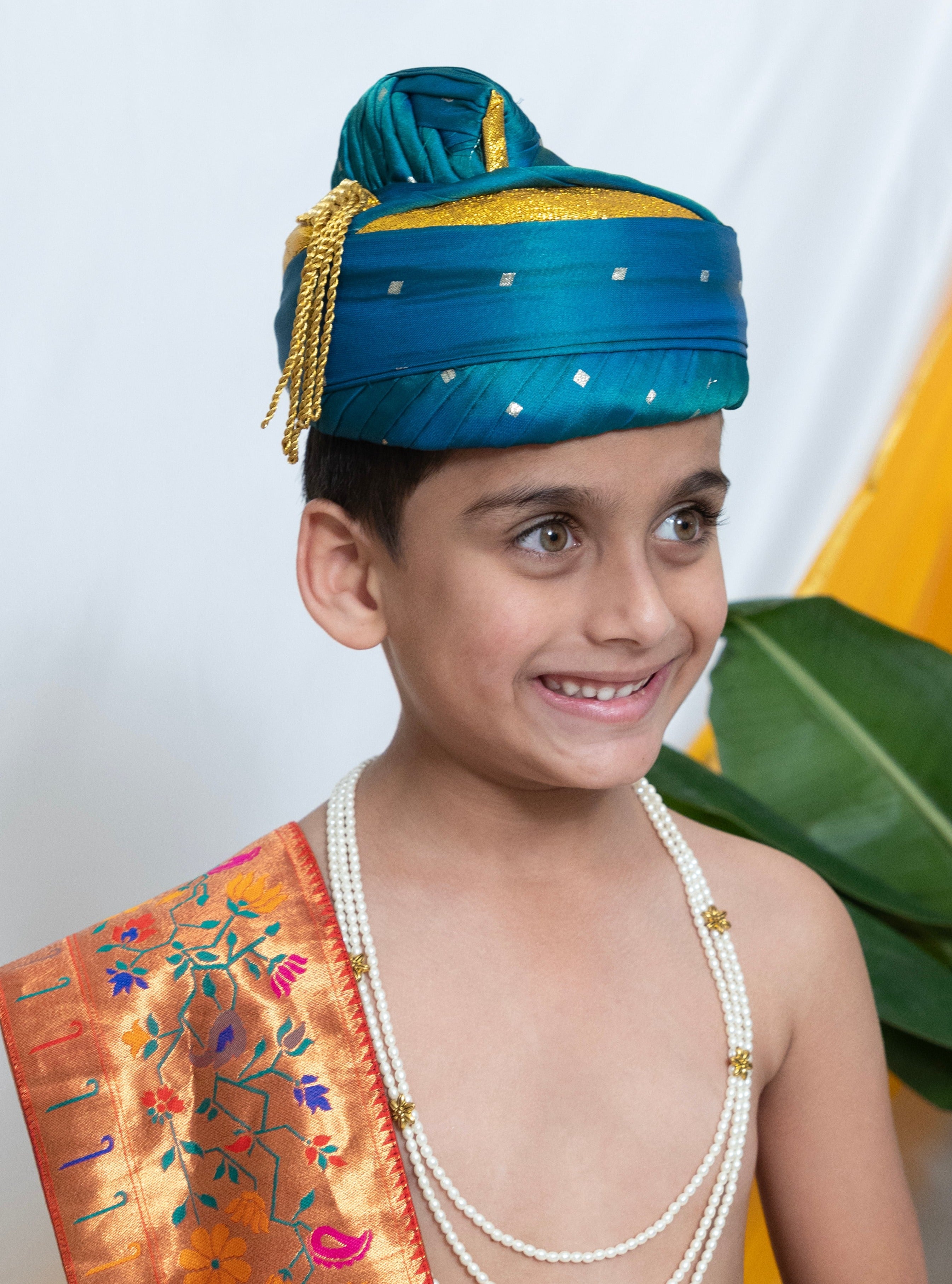 Aqua green satin taffeta Dhoti/Soval/Kad & Shawl/Upran/Shela with Paithani jari Border Set for Batu.Pre-stitched sovale uparane set includes Ready to wear Sovale & Uparane/Upavastra.Can be paired with a short kurta.This Set is ideal for rituals like Matrubhojan,Muhurt during Munj/Upanayan/Vratabandha/Thread Ceremony.