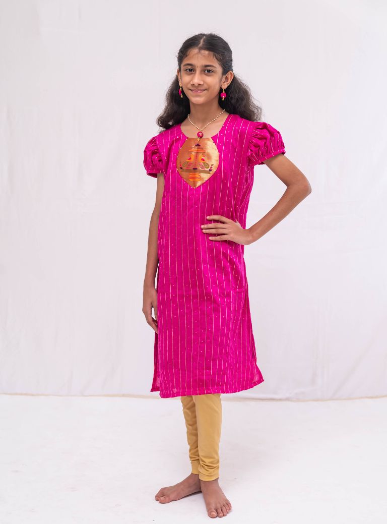Dark Pink satin chanderi sequined, puff sleeved kurti with paithani yoke pattern for Girls.Let your princess be as comfortable as in her casuals with carefully designed & crafted Comfort Ethnic Wear by Soyara Ethnics.Keep her fashion quotient high with timeless patterns, vibrant combinations and royal textiles.