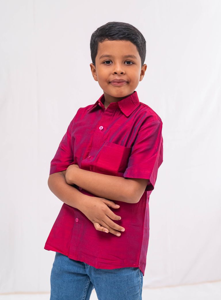 Crimson Plain Raw silk half sleeved shirt for Boys.This Crimson Plain Raw silk half sleeved shirt is designed for boys, providing both comfort and style.
