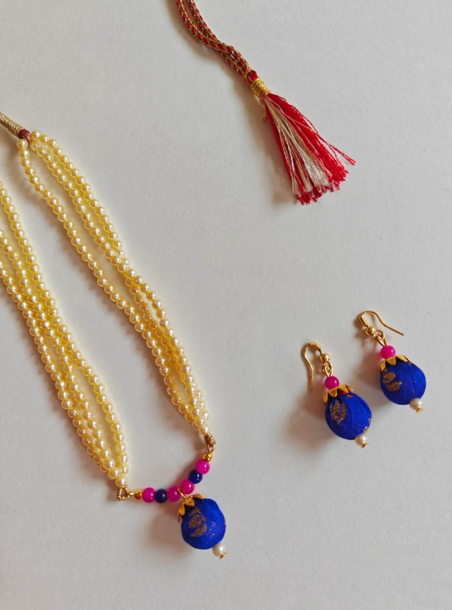 Royal blue brocade fabric pendant and triple layered pearls necklace in combination with royal blue and pink glass beads for Girls