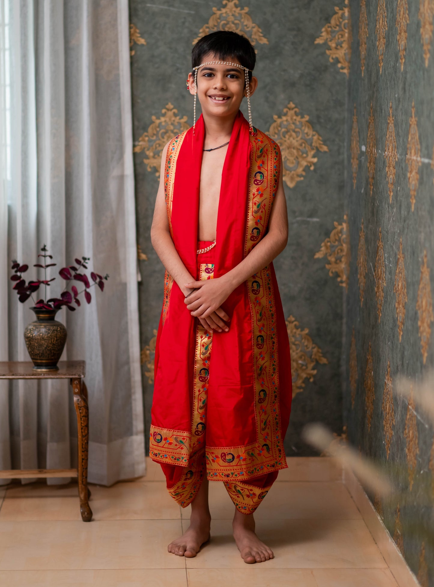 Red Mysore silk sovale uparane set with intricate Peacock Paithani border. Can be paired with a short kurta.Pre-stitched sovale uparane set includes Ready to wear Sovale & Uparane/Upavastra.Can be paired with a short kurta.This Set is ideal for rituals like Matrubhojan,Muhurt during Munj/Upanayan/Vratabandha/Thread Ceremony.