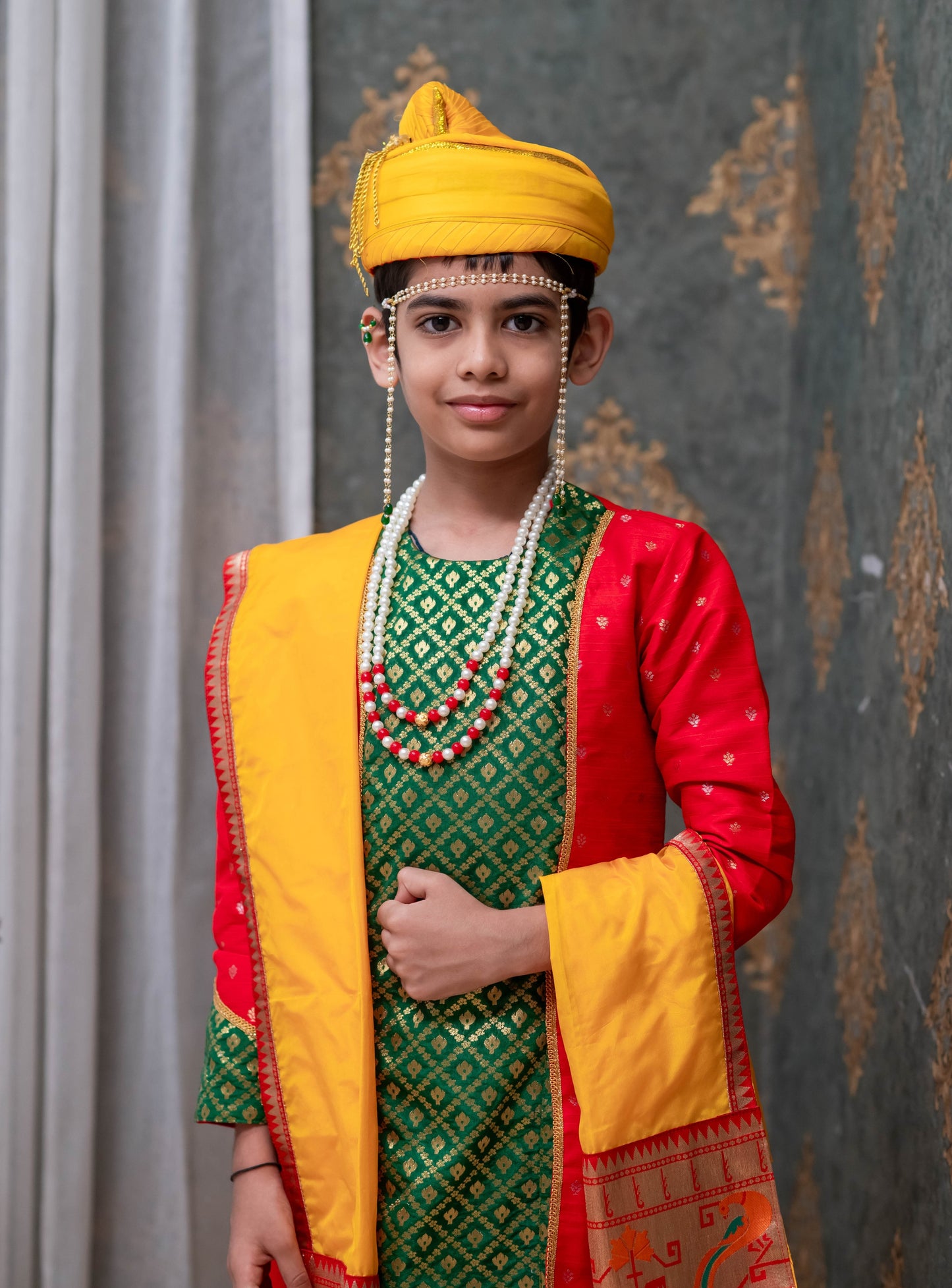 Sunshine Yellow Mysore silk sovale uparane set with intricate Peacock Paithani border and Red raw silk jari butta with green brocade silk paneled front open kurta with highlighted cuffs pattern for Batu.This Set is ideal for rituals like Matrubhojan,Muhurt during Munj/Upanayan/Vratabandha/Thread Ceremony.