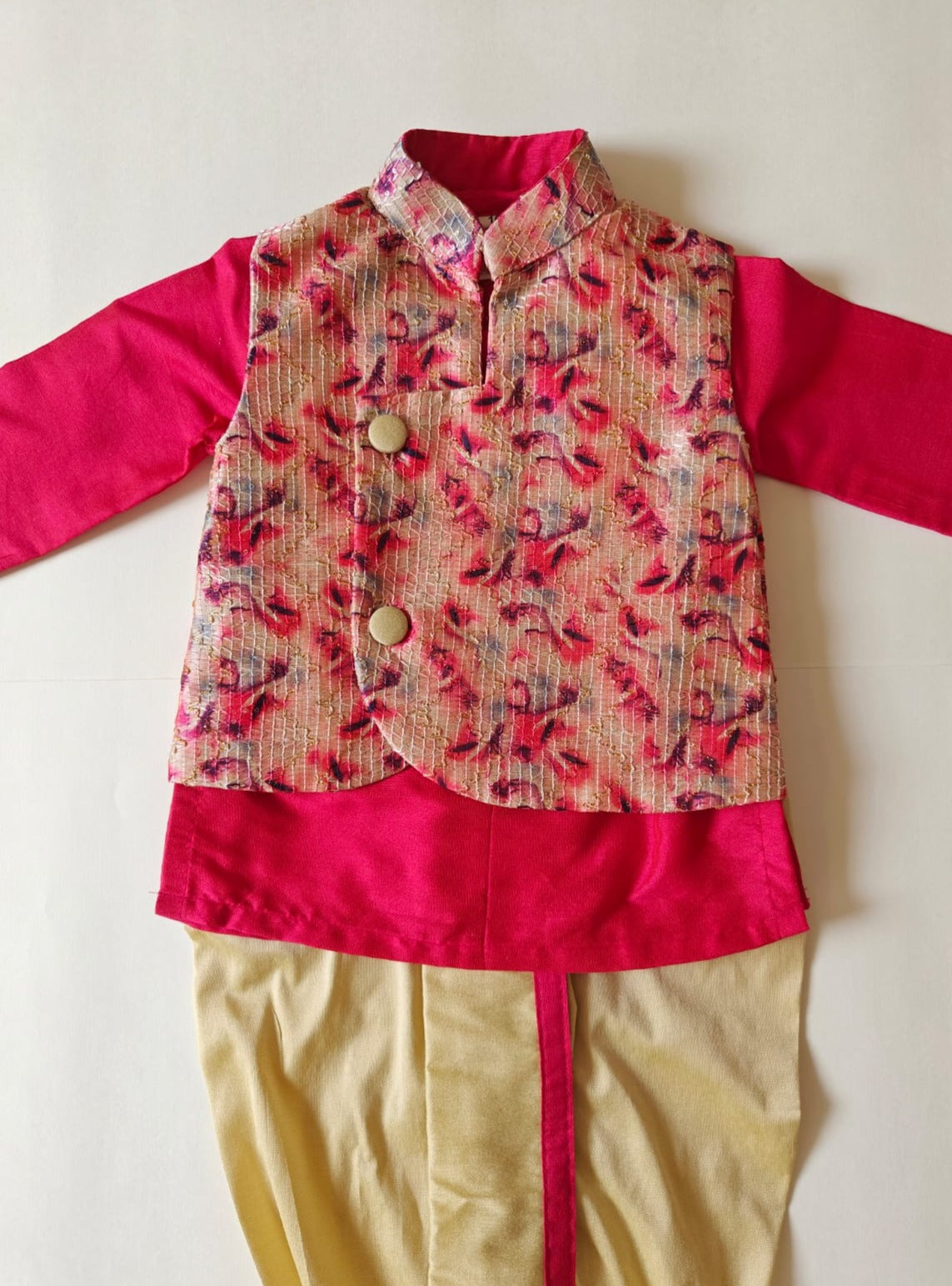 Rani pink cotton silk round neck kurta, Golden cotton silk dhoti with Tussar silk Jacket for Baby Boy.It's the perfect outfit for your baby's naming ceremony,naamkaran,annaprashan ceremony.Traditional dress for Noolukettu Ceremony,Pachavi Puja,cradle ceremony,Rice Ceremony,Chatti Puja etc. Apt gifting idea