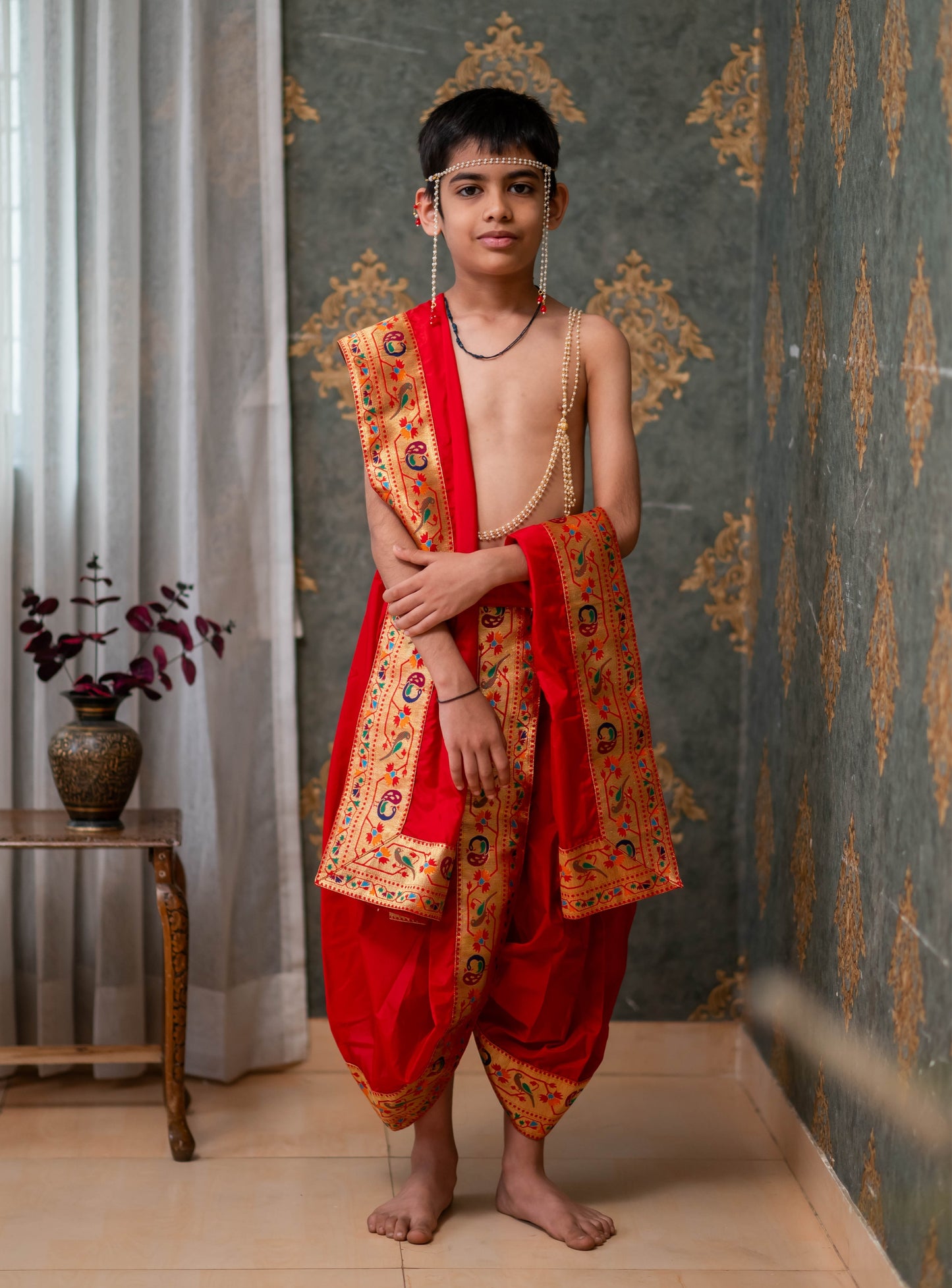 Red Mysore silk sovale uparane set with intricate Peacock Paithani border. Can be paired with a short kurta.Pre-stitched sovale uparane set includes Ready to wear Sovale & Uparane/Upavastra.Can be paired with a short kurta.This Set is ideal for rituals like Matrubhojan,Muhurt during Munj/Upanayan/Vratabandha/Thread Ceremony.