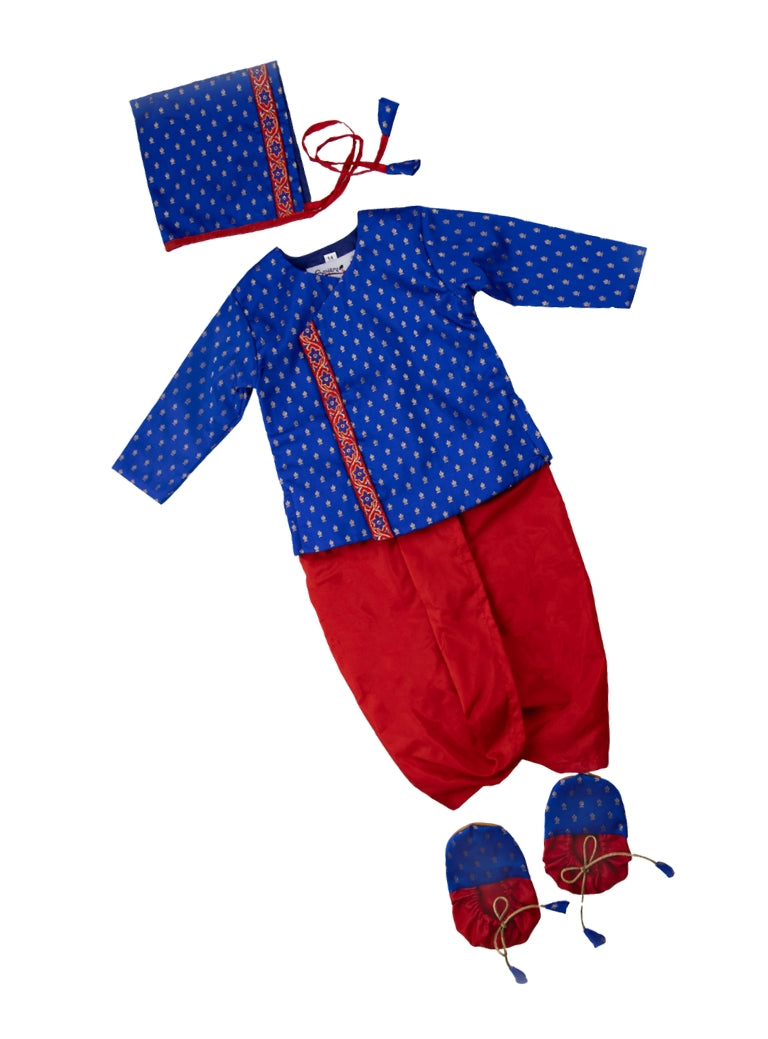 This Sharad Kurta and dhoti ensemble for baby boys features a soft brocade silk front-open kurta adorned with contrasting lace details, paired with a vibrant aqua green pooja silk dhoti. The set is completed with a matching bonnet and booties, offering a coordinated and elegant traditional outfit.