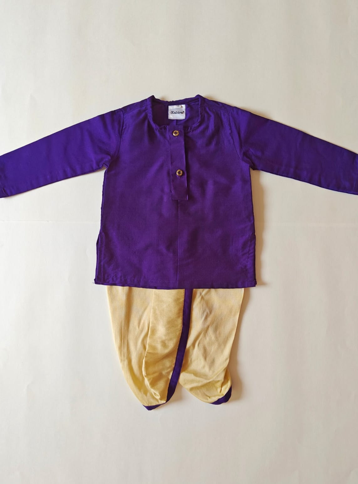 Purple cotton silk round neck kurta, Golden cotton silk dhoti with Tussar silk Jacket for Baby Boy.It's the perfect outfit for your baby's naming ceremony,naamkaran,annaprashan ceremony.Traditional dress for Noolukettu Ceremony,Pachavi Puja,cradle ceremony,Rice Ceremony,Chatti Puja etc. Apt gifting idea