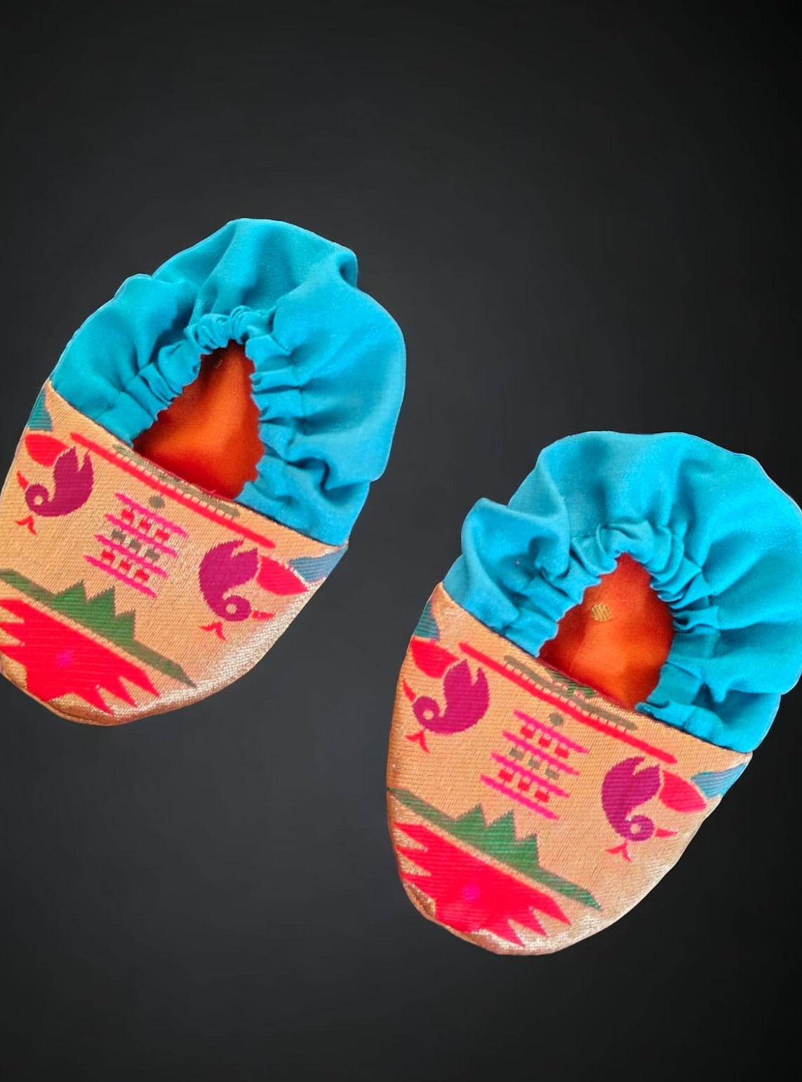 Orange brocade Angrakha kurta with Peacock Paithani yoke teamed with contrast teal blue dhoti for newborn baby boy.It's the perfect outfit for your baby's naming ceremony,naamkaran,annaprashan ceremony.Traditional dress for Noolukettu Ceremony,Pachavi Puja,cradle ceremony,Rice Ceremony,Chatti Puja etc. Apt gifting idea