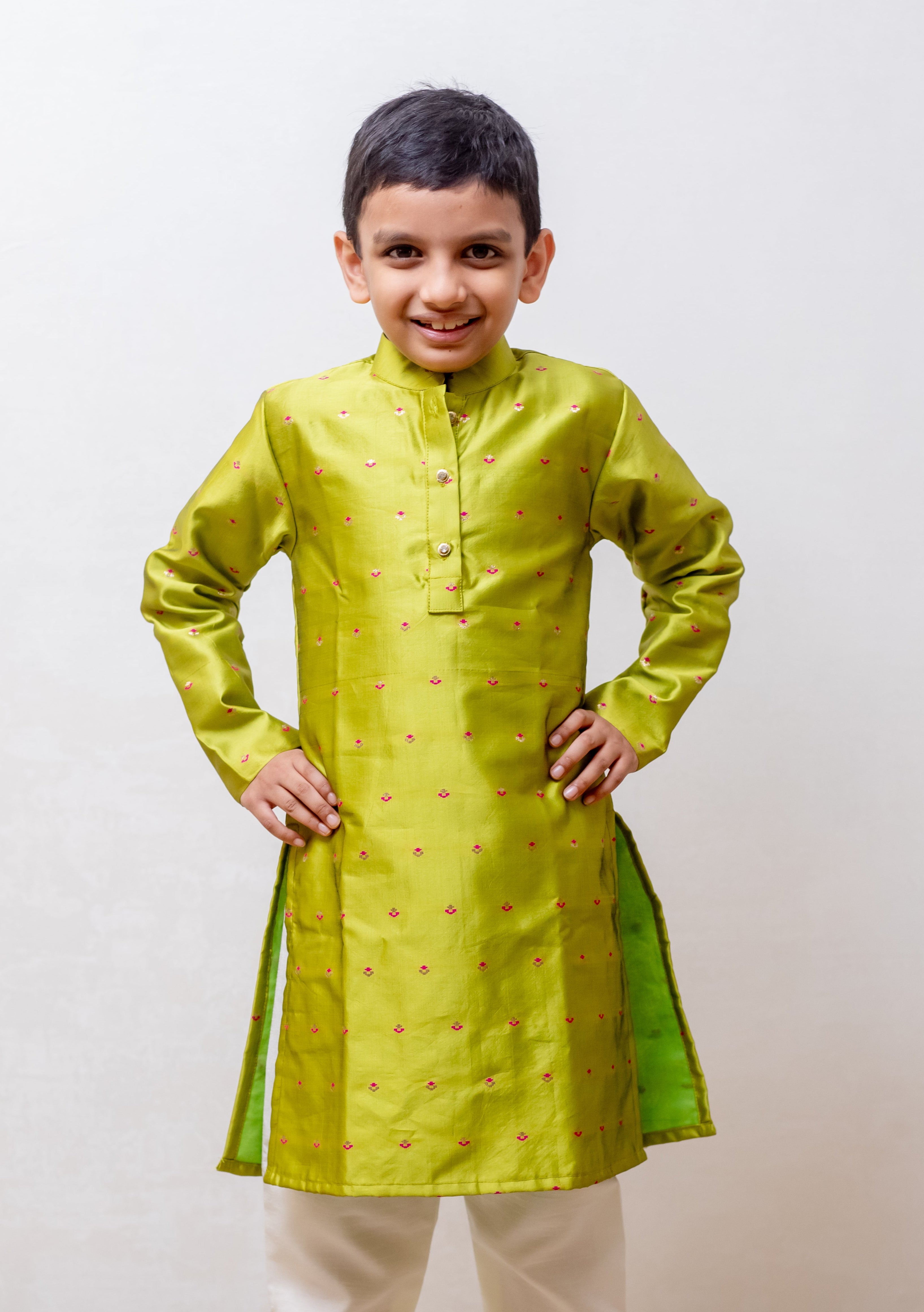 Parrot green taffeta silk stand collar kurta with intricate zari motifs for boys
