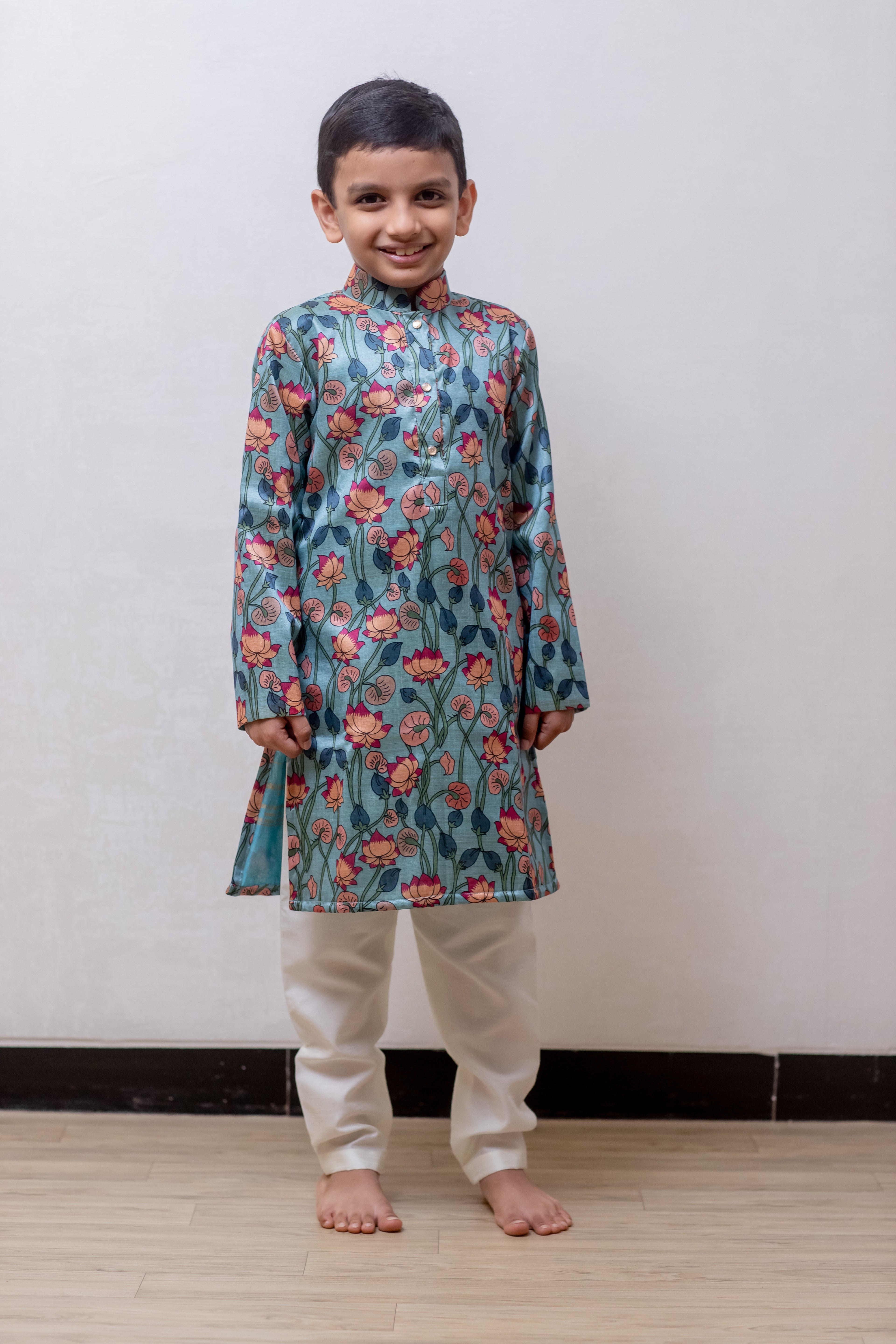 Greish Sky blue coloured lotus printed tussar silk kurta with stand collar for Boys