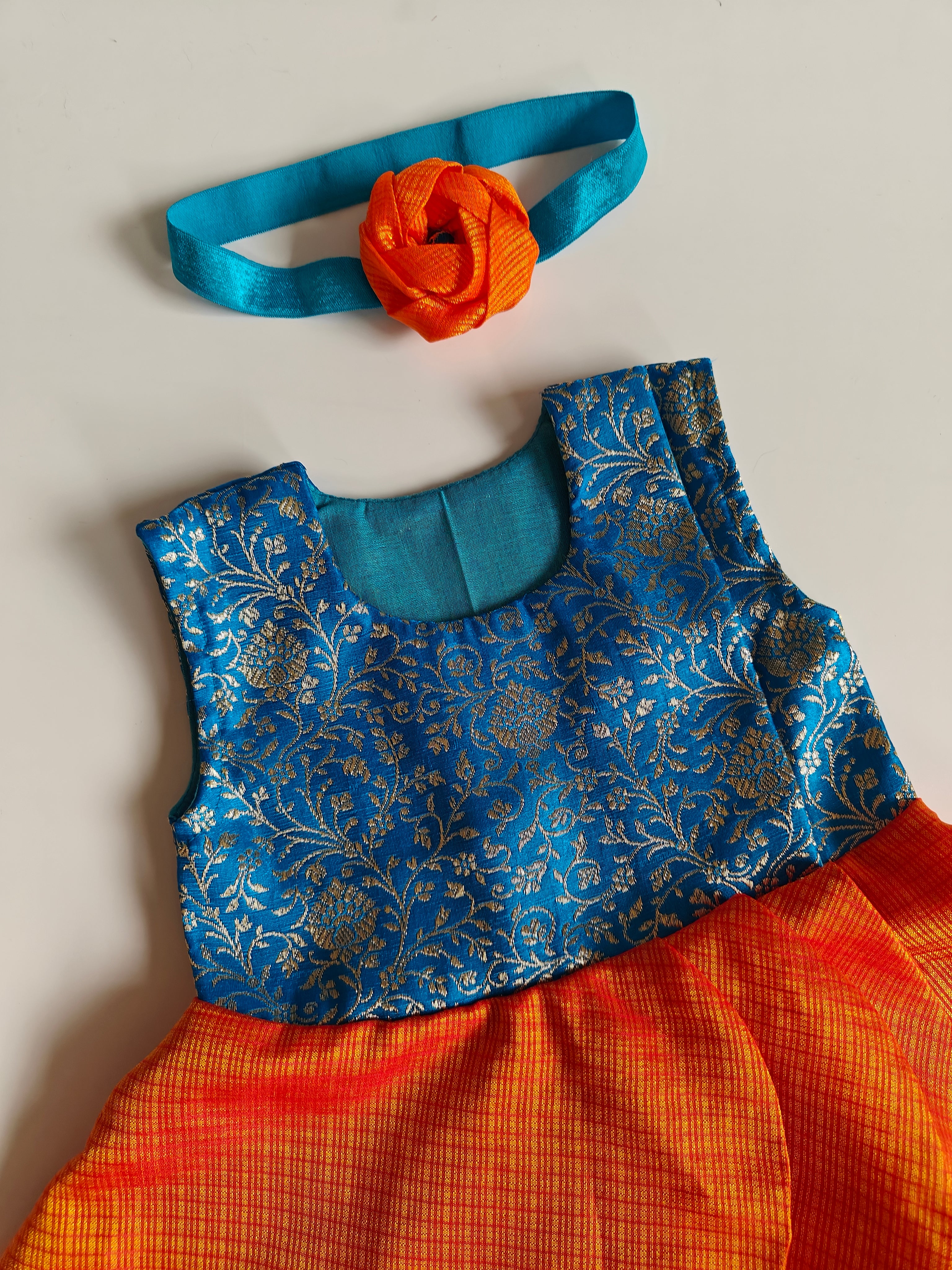 Arnaa Set - Blue Banarasi brocade bodice and Orange kotta silk open layered flair naming ceremony dress dress with bloomer ,headband and booties for a newborn baby girls