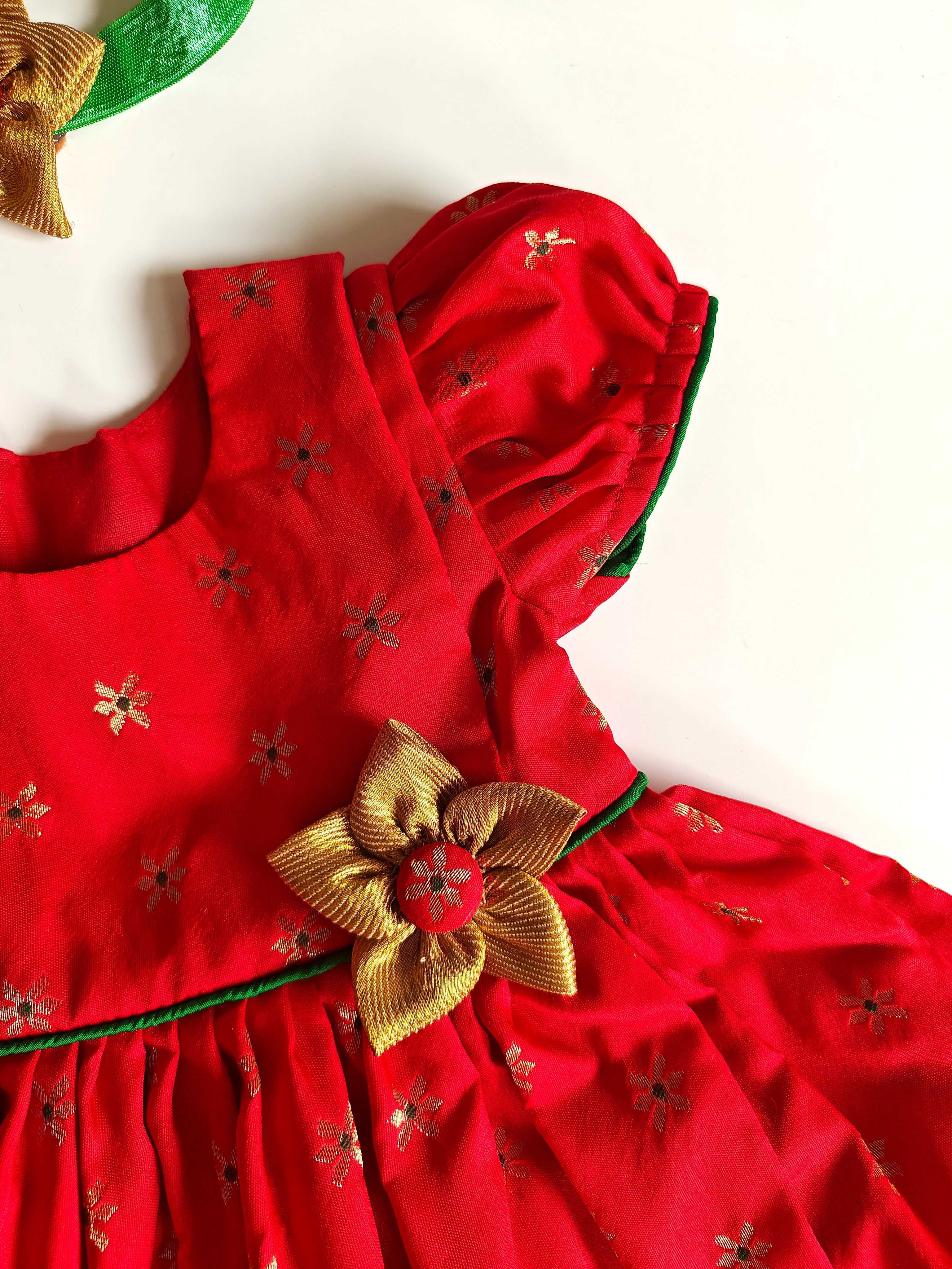Sadafuli set - Red brocade silk front open frock with puff sleeves, embellished with a handmade fabric flower for Baby Girls.It's the perfect outfit for your baby's naming ceremony,naamkaran or annaprashan ceremony.Traditional dress for Noolukettu Ceremony,Pachavi Puja,cradle ceremony,Rice Ceremony,Chatti Puja etc.