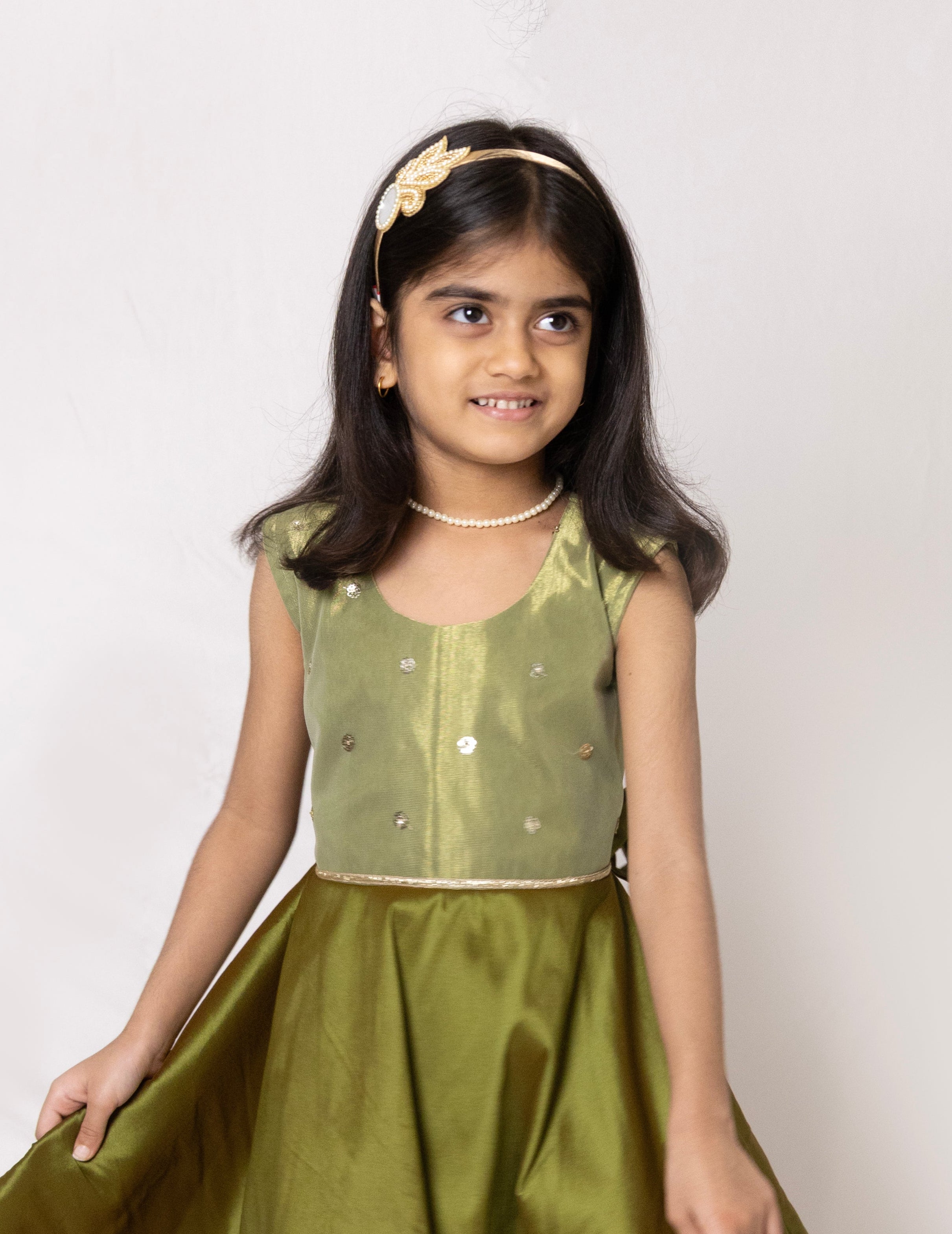 Olive green Taffeta silk kite dress with sequined bodice embellished with zari lace for Girls