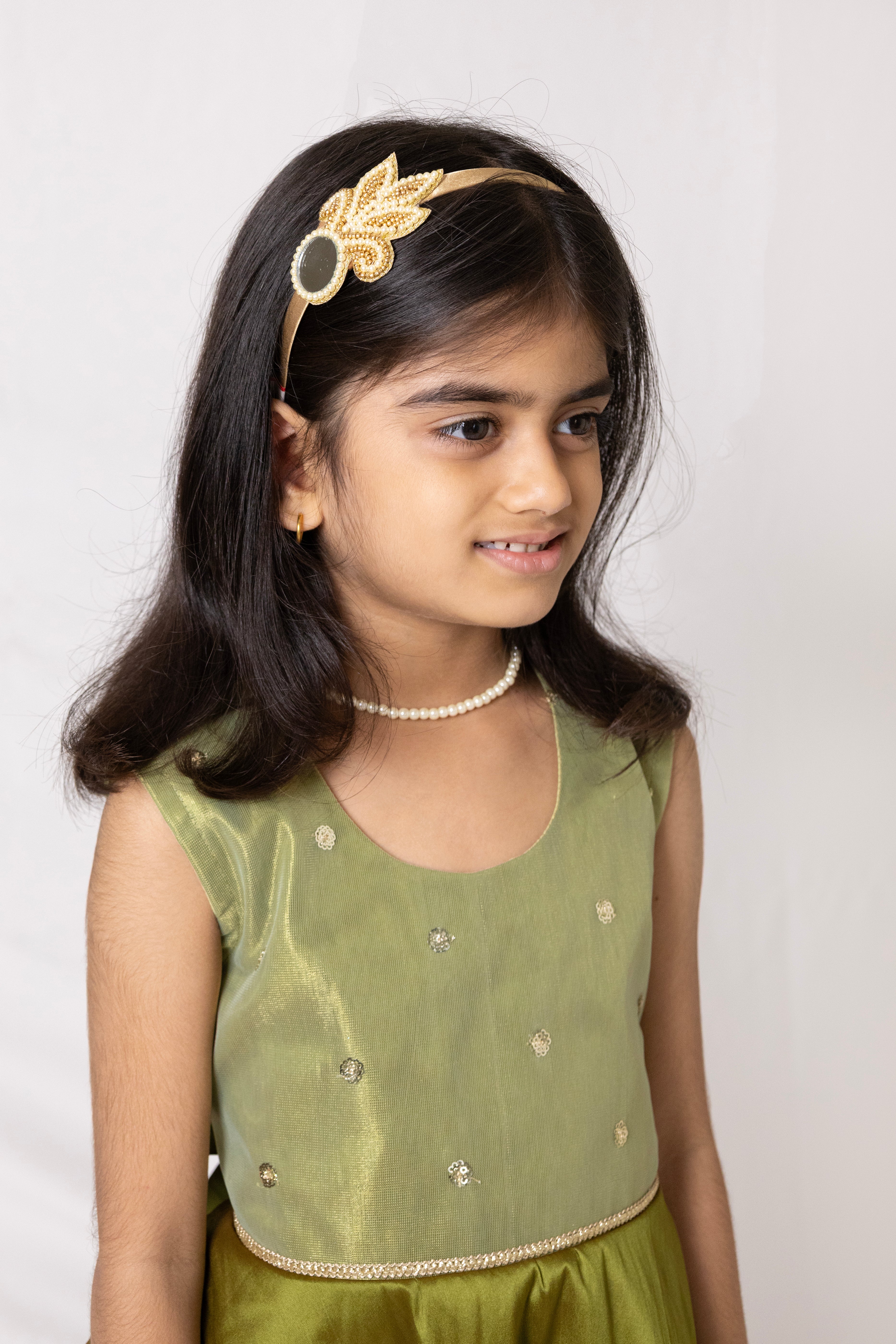 Olive green Taffeta silk kite dress with sequined bodice embellished with zari lace for Girls
