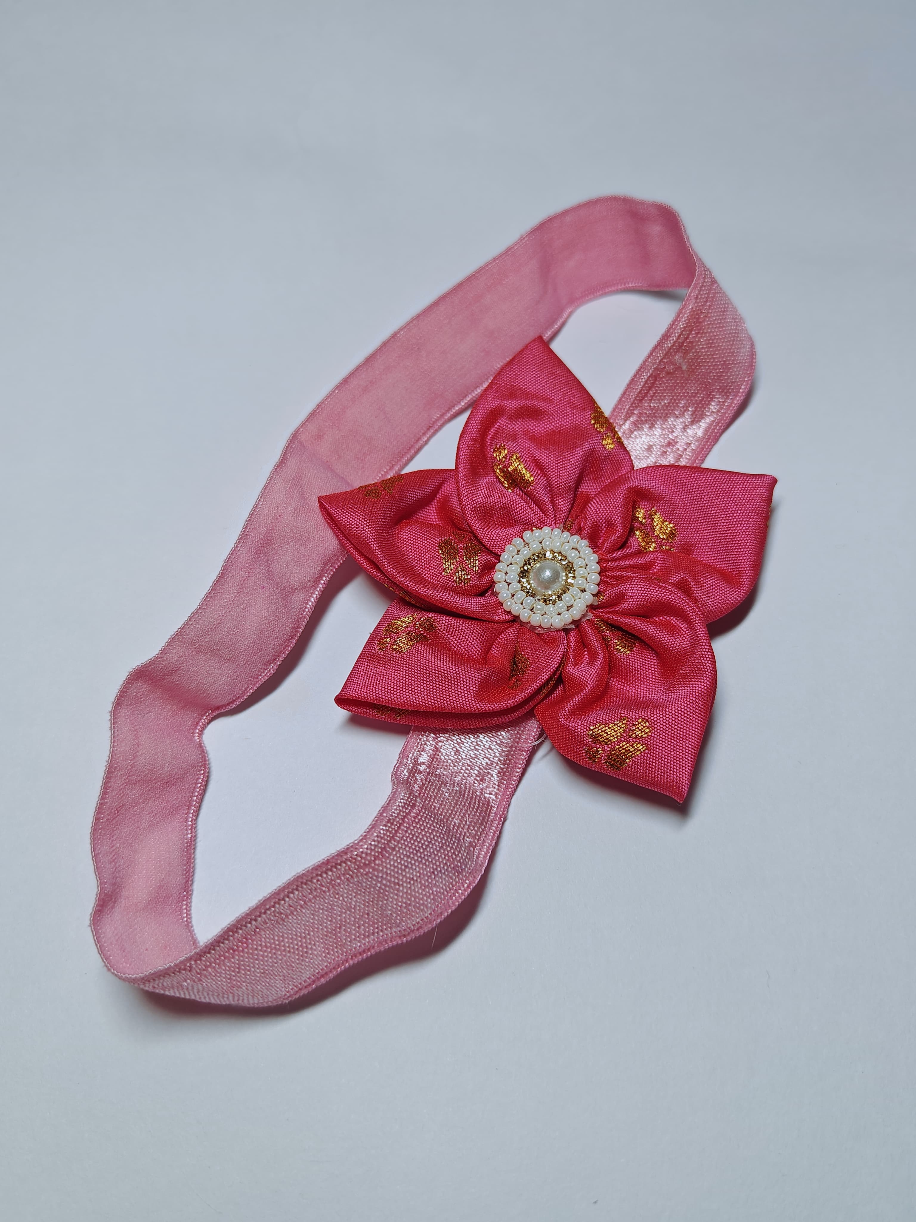 Bright Coloured Sadafuli Flower Stretchable headband for baby girl.Adorn your princess with head to toe premium quality handcrafted accessories made from allergy free, best quality materials.