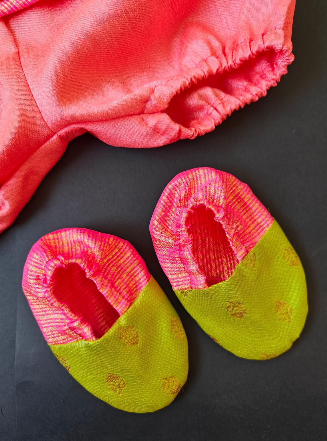 Lime Green soft brocade & pink front open layered dress with bloomer,headband,booties for a newborn baby girl.It's the perfect outfit for your baby's naming ceremony,naamkaran or annaprashan ceremony.Traditional dress for Noolukettu Ceremony,Pachavi Puja,cradle ceremony,Rice Ceremony,Chatti Puja etc. Apt gifting idea