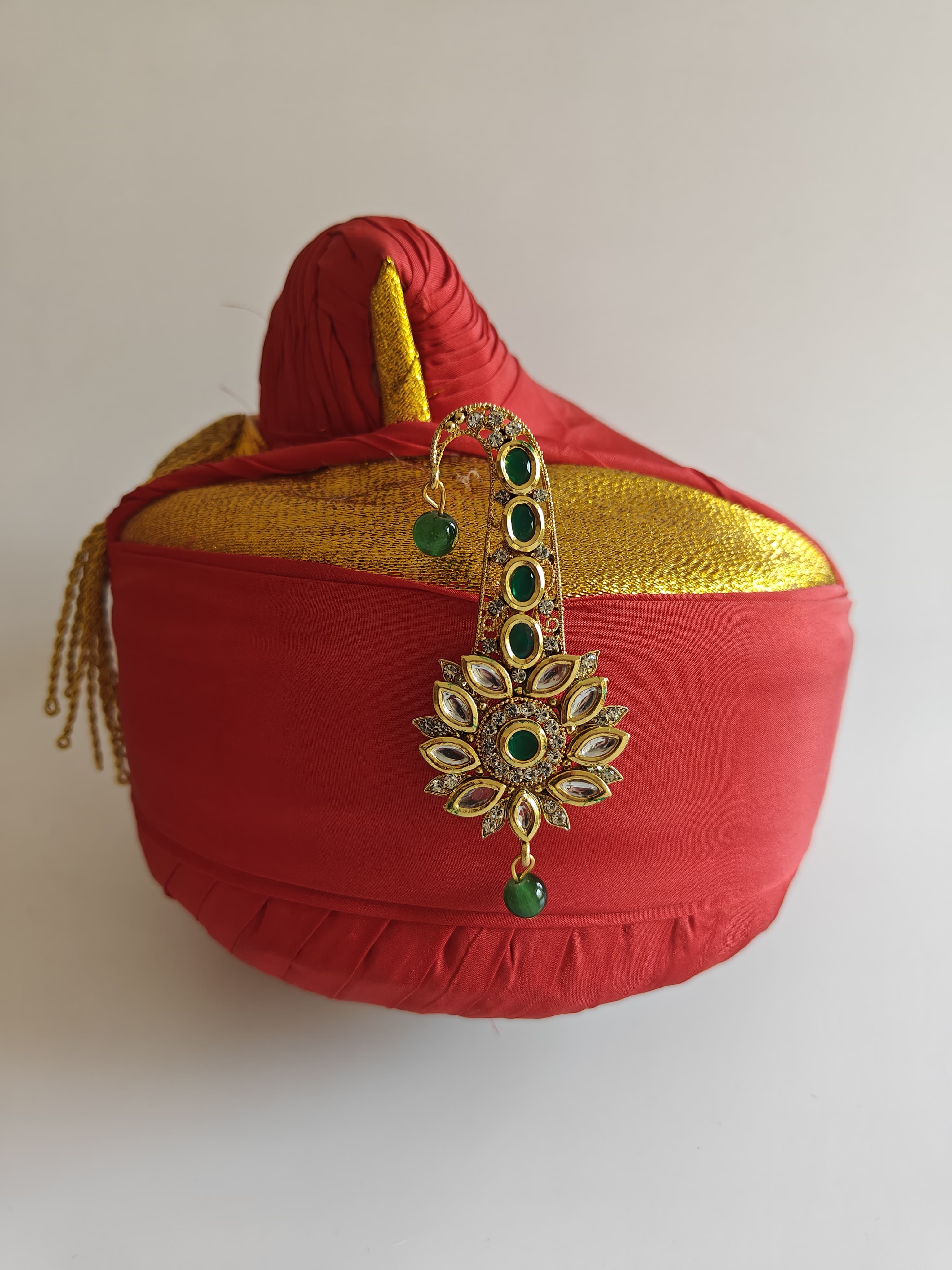 Green and white Kundan Jadau pagadi brooch for batu or groom.