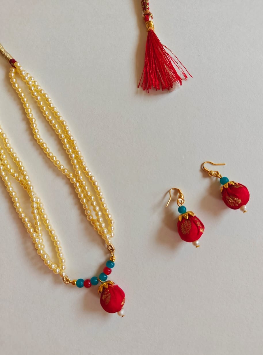Red brocade fabric pendant and triple layered pearls necklace in combination with red and teal blue glass beads for Girls
