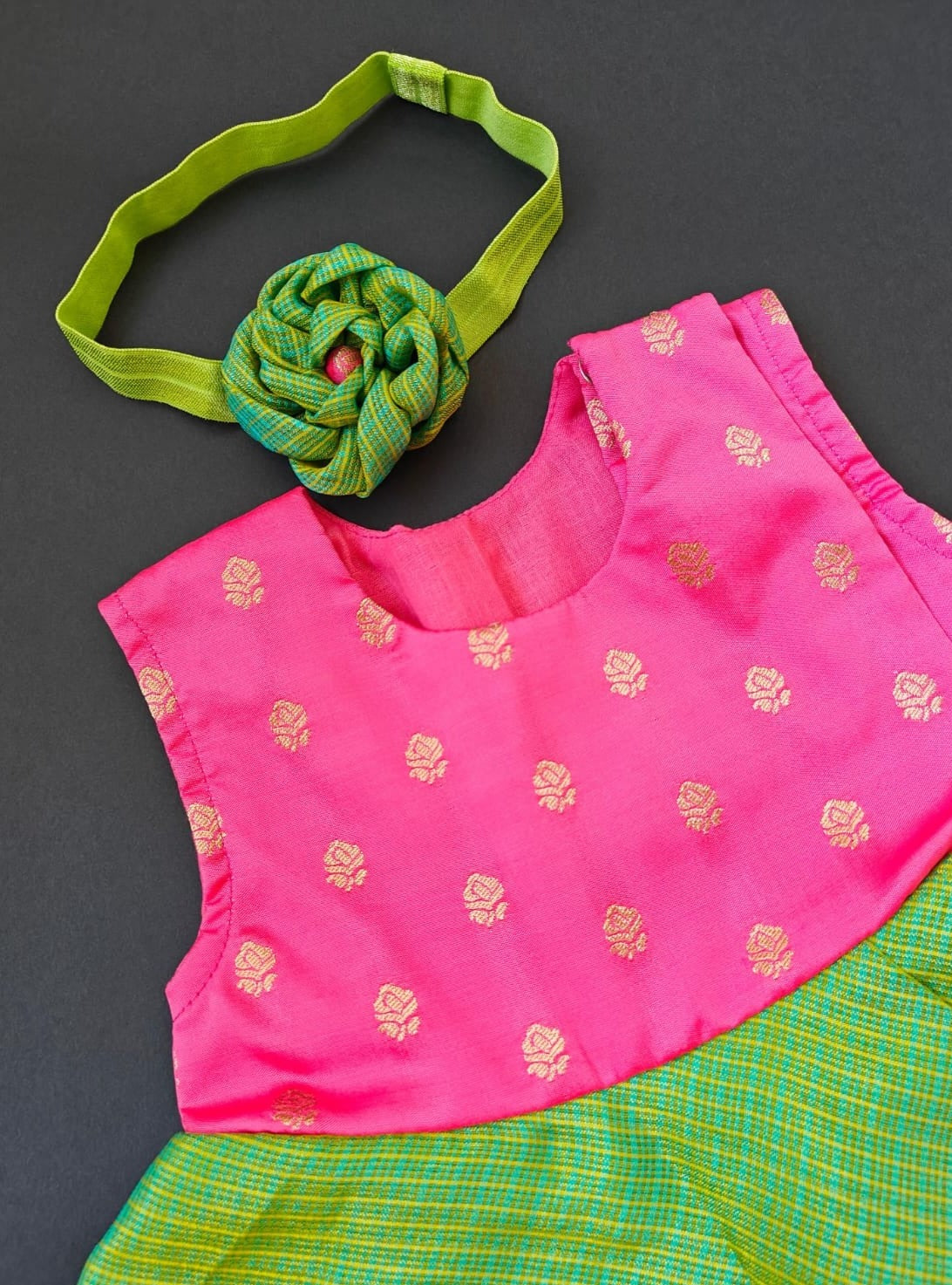 Pink soft brocade & green front open layered dress with bloomer,headband,booties for a newborn baby girl.It's the perfect outfit for your baby's naming ceremony,naamkaran or annaprashan ceremony.Traditional dress for Noolukettu Ceremony,Pachavi Puja,cradle ceremony,Rice Ceremony,Chatti Puja etc. Apt gifting idea