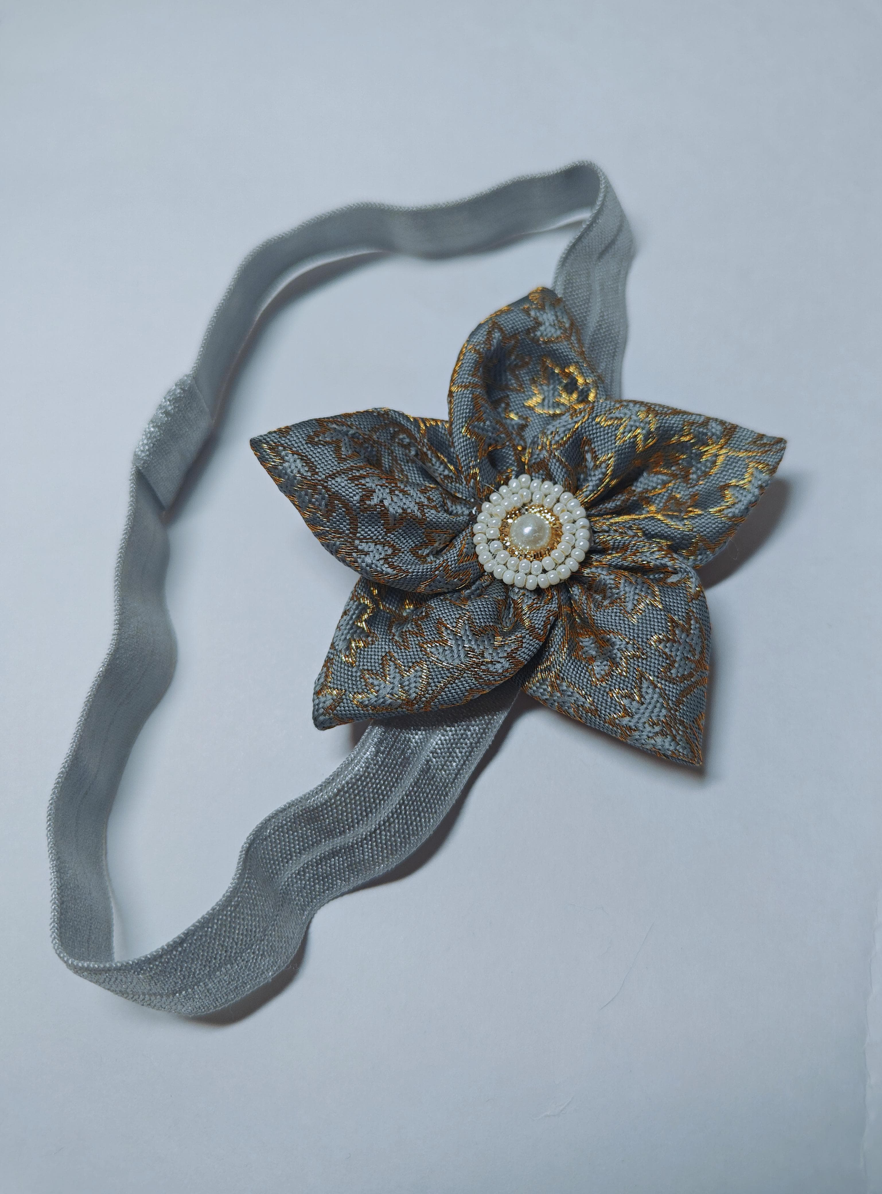 Cool Coloured Sadafuli Flower Stretchable headband for baby girl.Adorn your princess with head to toe premium quality handcrafted accessories made from allergy free, best quality materials.