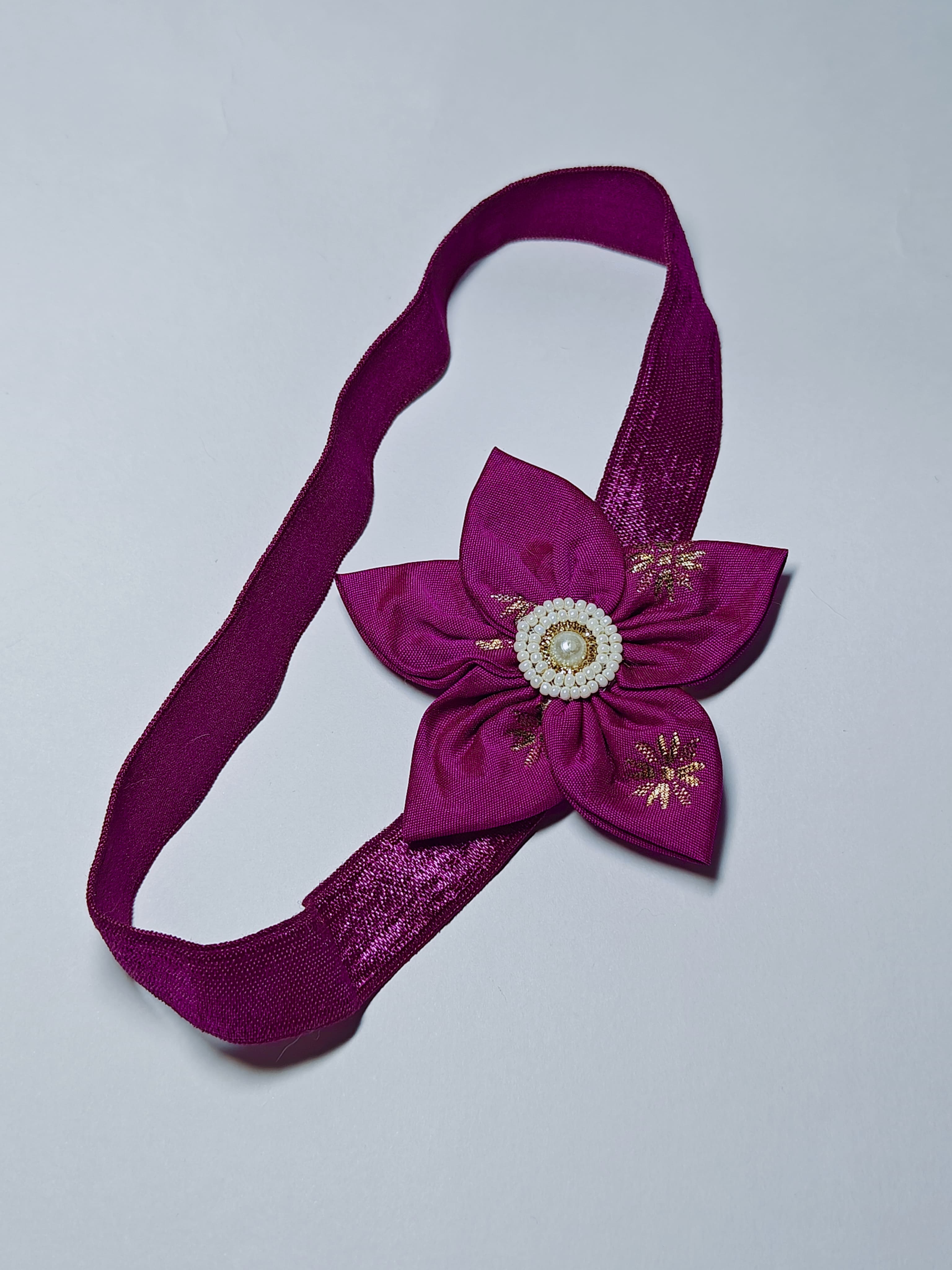 Cool Coloured Sadafuli Flower Stretchable headband for baby girl.Adorn your princess with head to toe premium quality handcrafted accessories made from allergy free, best quality materials.