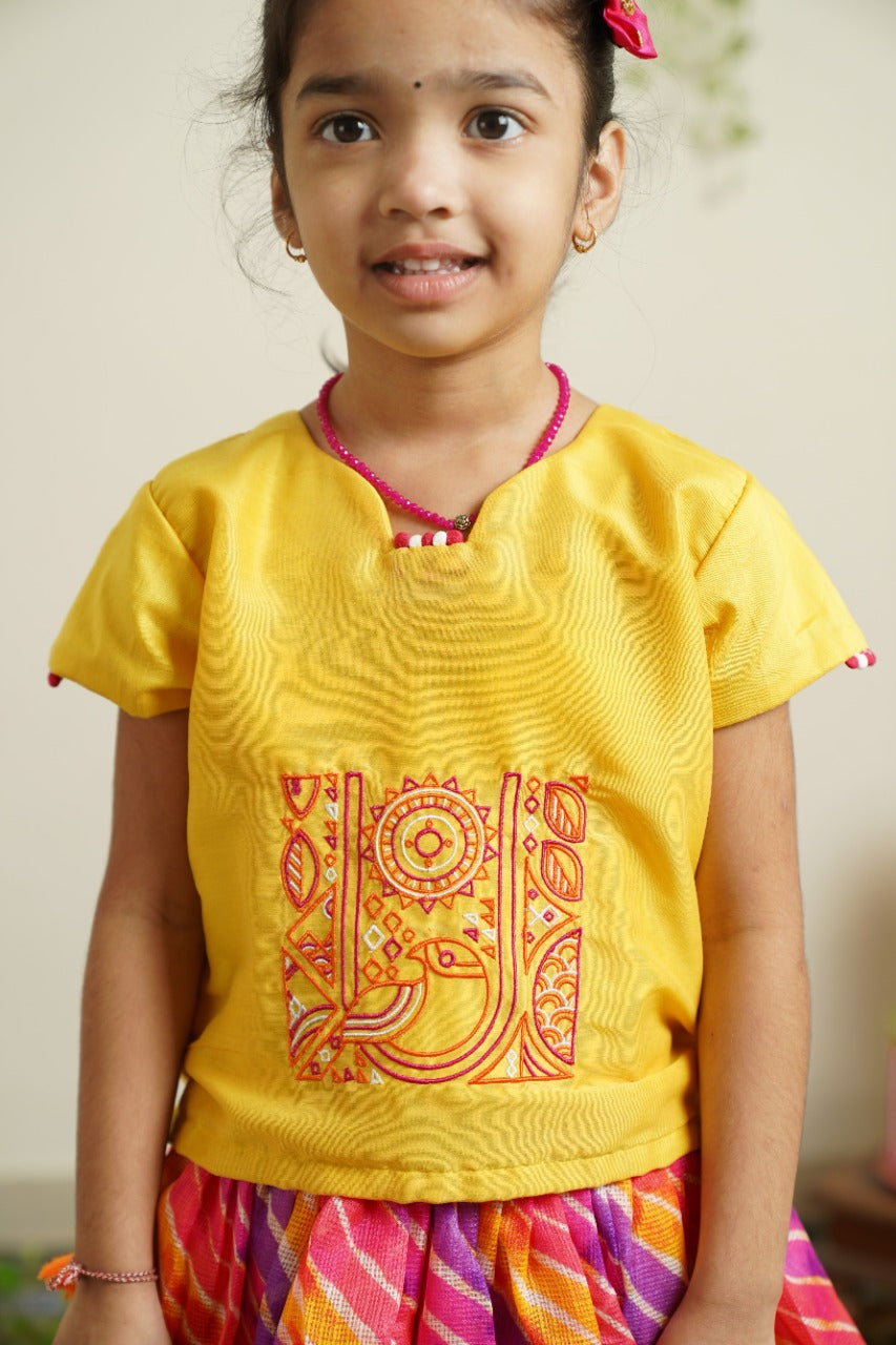 Purple pink yellow leheriya kotta elasticated long skirt with sunshine yellow cotton silk crop top.Let your princess be as comfortable as in her casuals with carefully designed & crafted Comfort Ethnic Wear by Soyara Ethnics.Keep her fashion quotient high with timeless patterns, vibrant combinations and royal textiles.