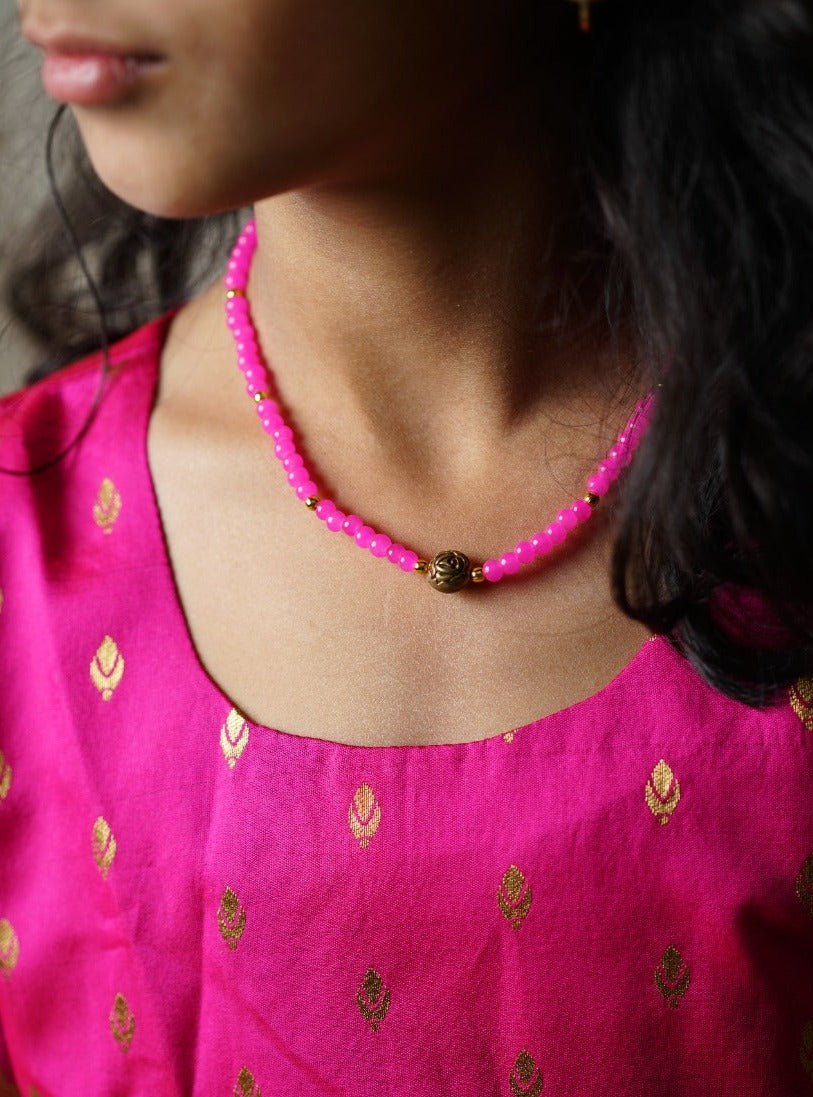 Fuchsia pink brocade taffeta silk frock with intricate Paithani border for girls.Let your princess be as comfortable as in her casuals with carefully designed & crafted Comfort Ethnic Wear by Soyara Ethnics.Keep her fashion quotient high with timeless patterns, vibrant combinations and royal textiles.