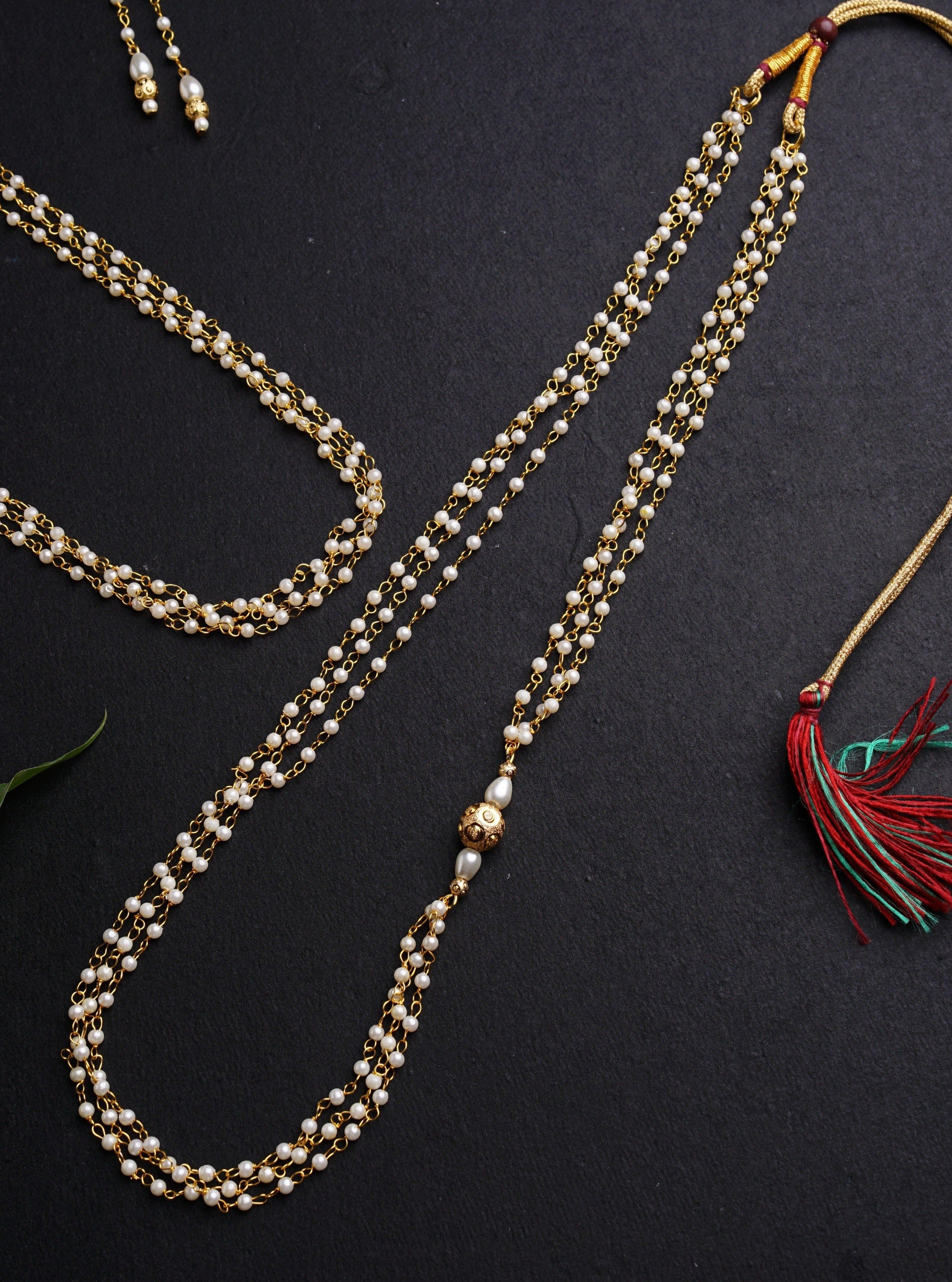 Vratabandha Pearls Accessories Combo with Golden Findings for Batu includes Pearl Bhikbali,Pearl Kanthi,Pearl Mundavalya and Janav. Mundavalya,kanthi,bhikbali,topi,pagdi are boys accessories exclusively designed using Pearls,glass beads,jadau & gold plated findings for Batu,for Upanayan/Vratabandha/munj /thread ceremony.