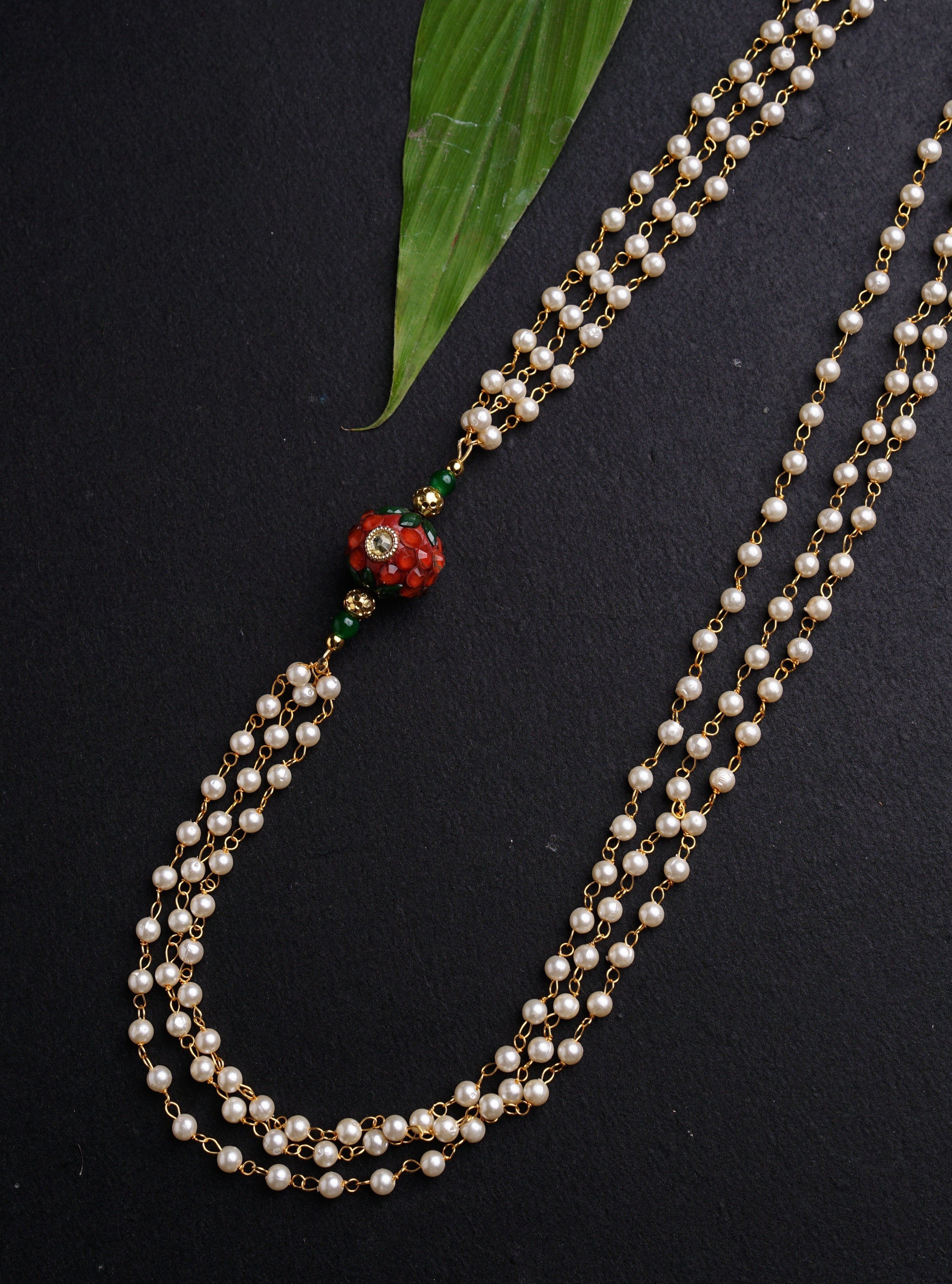 Dark Green Round Pachi bead with Pearl Triple Layer Kanthi for Batu. It is worn by Batu for Vratabandh/Munj/Upnayan/ Thread Ceremony. Mundavalya,kanthi,bhikbali,topi,pagdi are boys accessories exclusively designed using Pearls,glass beads,jadau & gold plated findings for Batu,for Upanayan/Vratabandha/munj /thread ceremony.