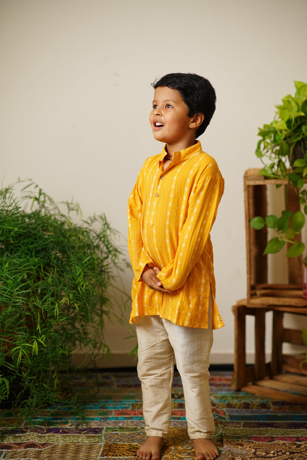 Mango yellow Handloom Cotton Stand Collar Kurta.Kurtas with collar or Angrakha pattern teamed with salwar are the best choice for any festive occasion for boys.They are Trendy, Easy to wear and comfortable to carry.