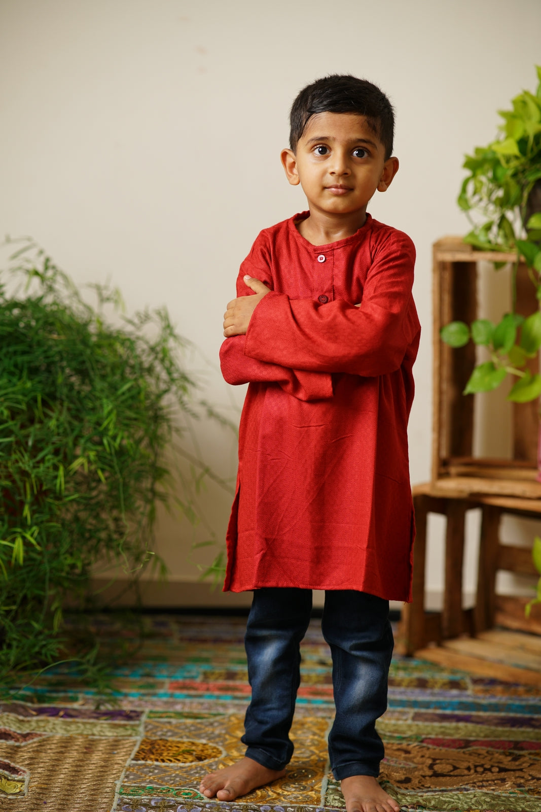 Tomato red cotton round neck Kurta.Kurtas with collar or Angrakha pattern teamed with salwar are the best choice for any festive occasion for boys.They are Trendy, Easy to wear and comfortable to carry.
