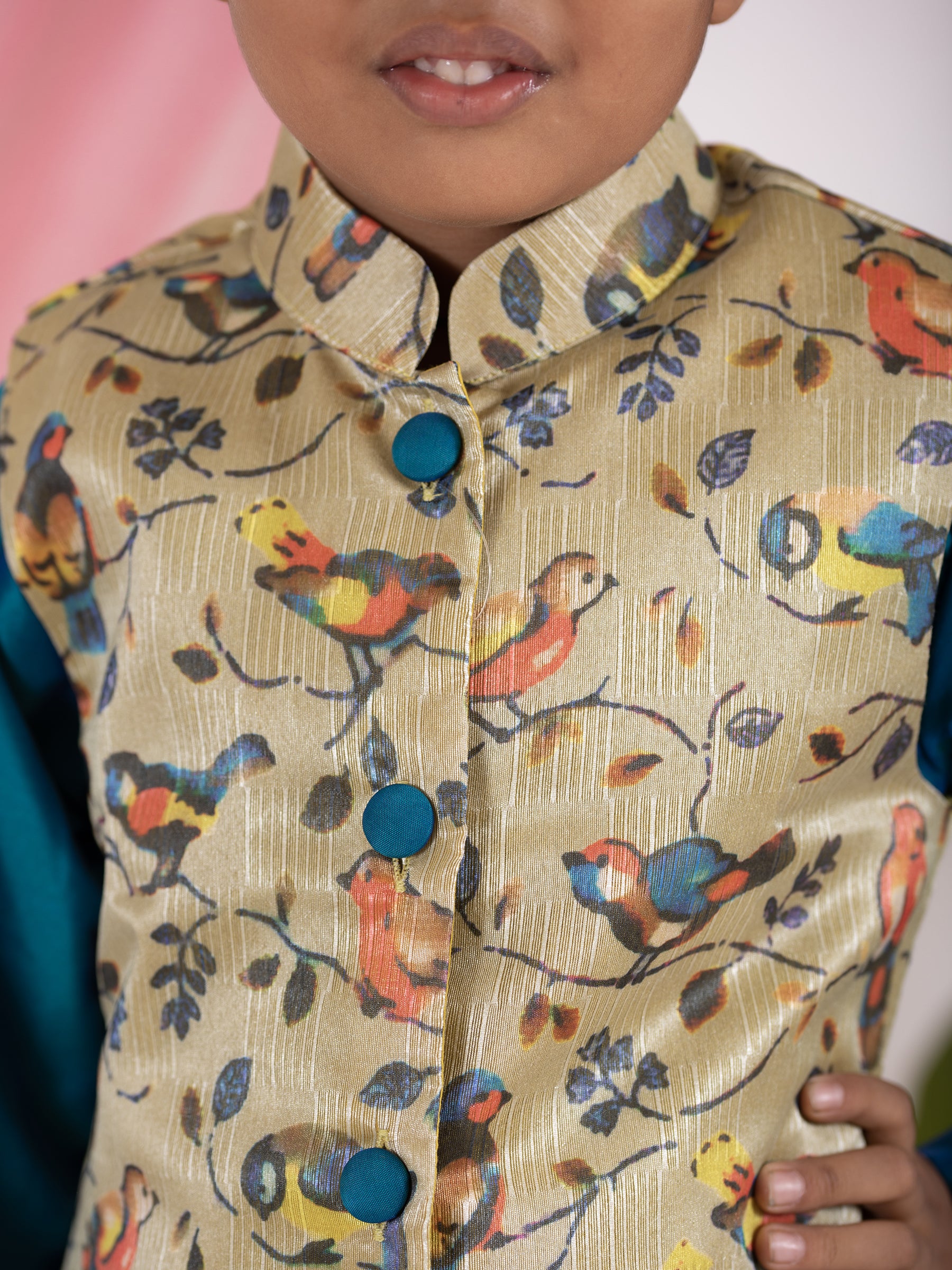 Peacock blue taffeta silk kurta and salwar set with digital printed tussar silk jacket.Kurtas with collar or Angrakha pattern teamed with salwar are the best choice for any festive occasion for boys. They are Trendy, Easy to wear and comfortable to carry.