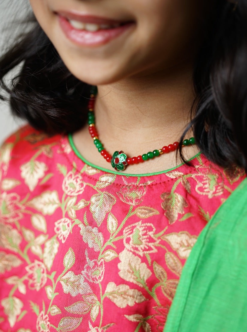 Parrot green chanderi ghagra with carrot pink brocade choli &  parrot green chanderi dupatta.Let your princess be as comfortable as in her casuals with carefully designed & crafted Comfort Ethnic Wear by Soyara Ethnics.Keep her fashion quotient high with timeless patterns, vibrant combinations and royal textiles.