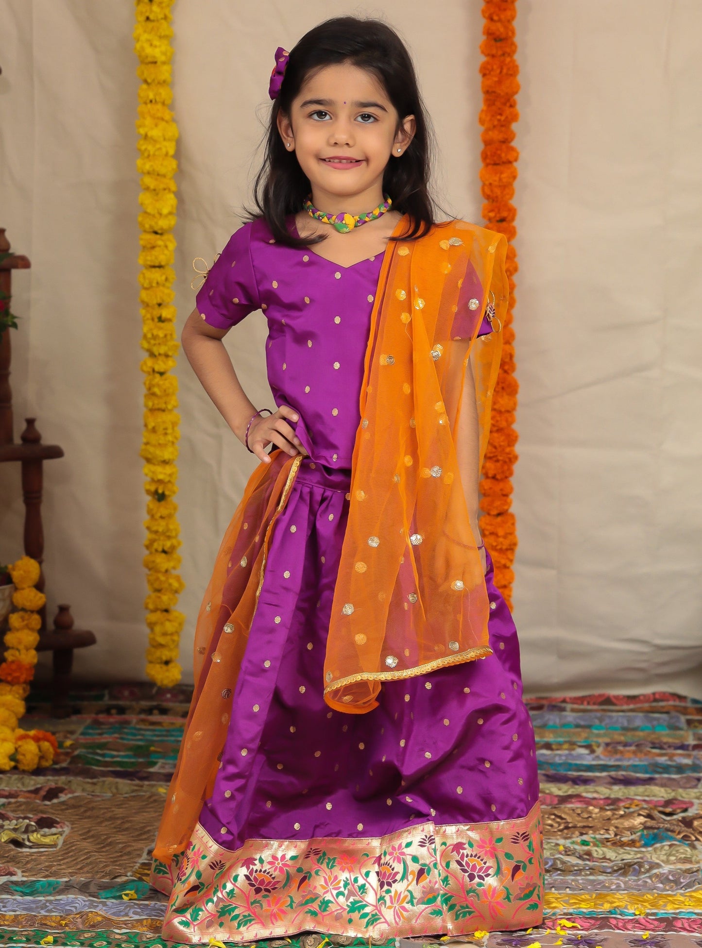 Purple Taffeta Silk Ghagra Choli with a broad statement Paithani Border for girl.Let your princess be as comfortable as in her casuals with carefully designed & crafted Comfort Ethnic Wear by Soyara Ethnics.Keep her fashion quotient high with timeless patterns, vibrant combinations and royal textiles.