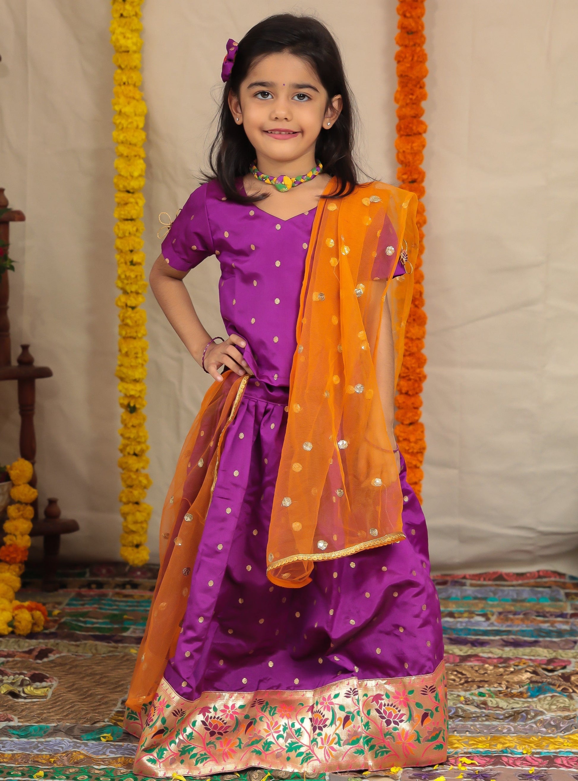 Purple Taffeta Silk Ghagra Choli with a broad statement Paithani Border for girl.Let your princess be as comfortable as in her casuals with carefully designed & crafted Comfort Ethnic Wear by Soyara Ethnics.Keep her fashion quotient high with timeless patterns, vibrant combinations and royal textiles.