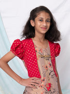 Pastel mauve coloured floral printed tissue kurti with red coloured silk false shrugs for Girls.Let your princess be as comfortable as in her casuals with carefully designed & crafted Comfort Ethnic Wear by Soyara Ethnics.Keep her fashion quotient high with timeless patterns, vibrant combinations and royal textiles.