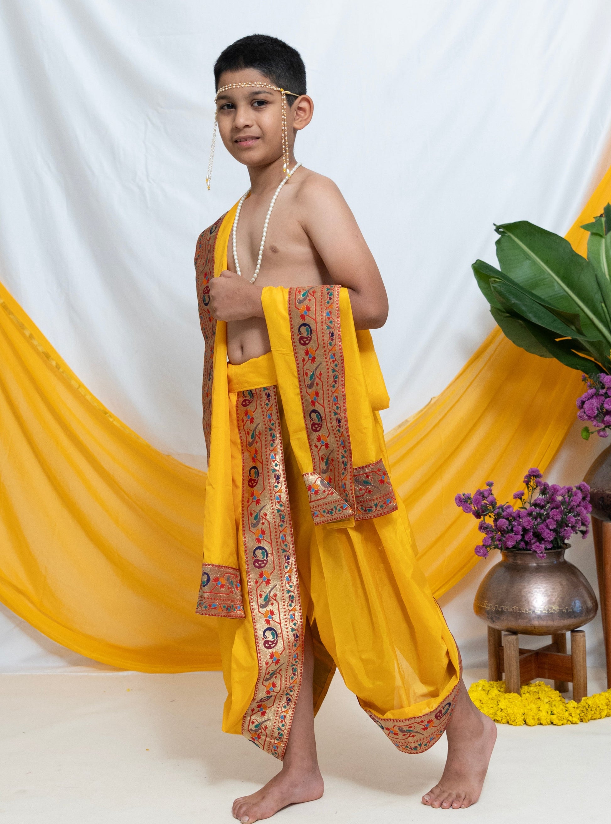 Yellow Mysore Silk Dhoti/Soval/Kad & Shawl/Upran/Shela with Paithani jari Border Set for Batu.Pre-stitched sovale uparane set includes Ready to wear Sovale & Uparane/Upavastra.Can be paired with a short kurta.This Set is ideal for rituals like Matrubhojan,Muhurt during Munj/Upanayan/Vratabandha/Thread Ceremony.