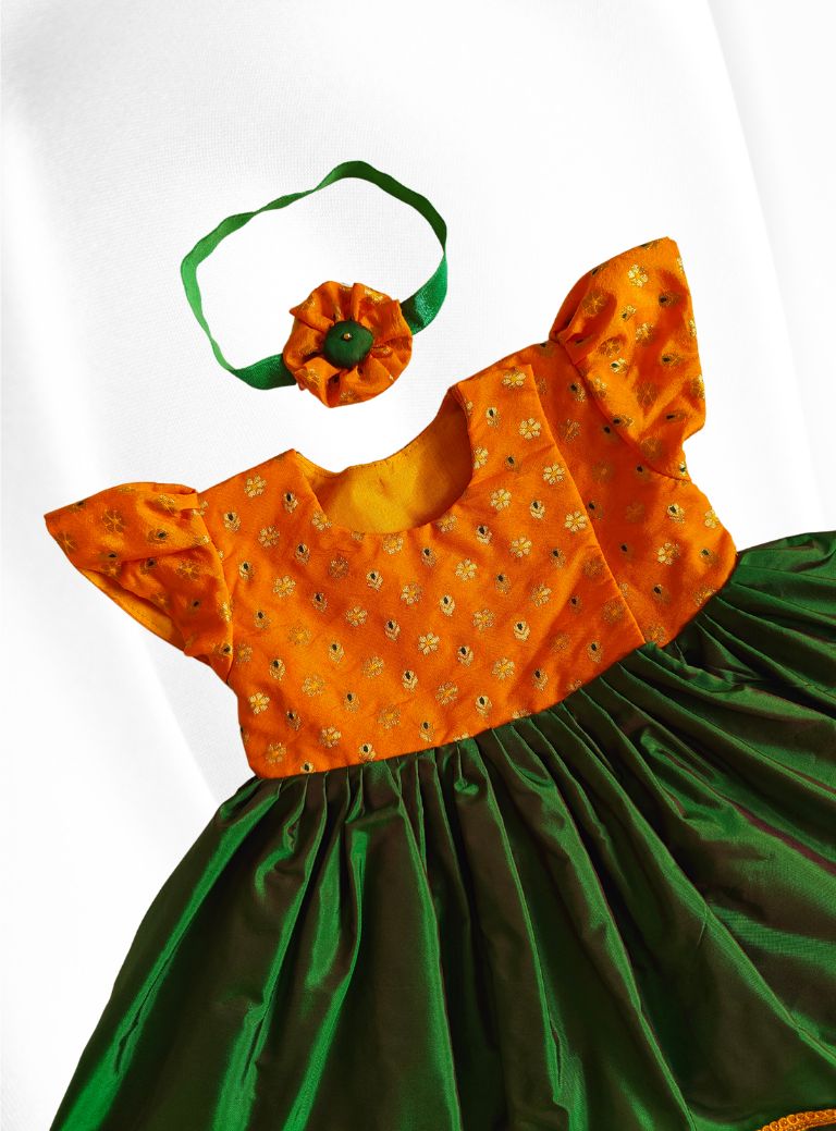 Yellow brocade with bottle green  silk front open flared newborn baby girl frock for naming ceremony with bonnet,bloomer & booties.It's the perfect outfit for your naamkaran or annaprashan ceremony.Traditional dress for Noolukettu Ceremony,Pachavi Puja,cradle ceremony,Rice Ceremony,Chatti Puja etc.Apt gifting idea 