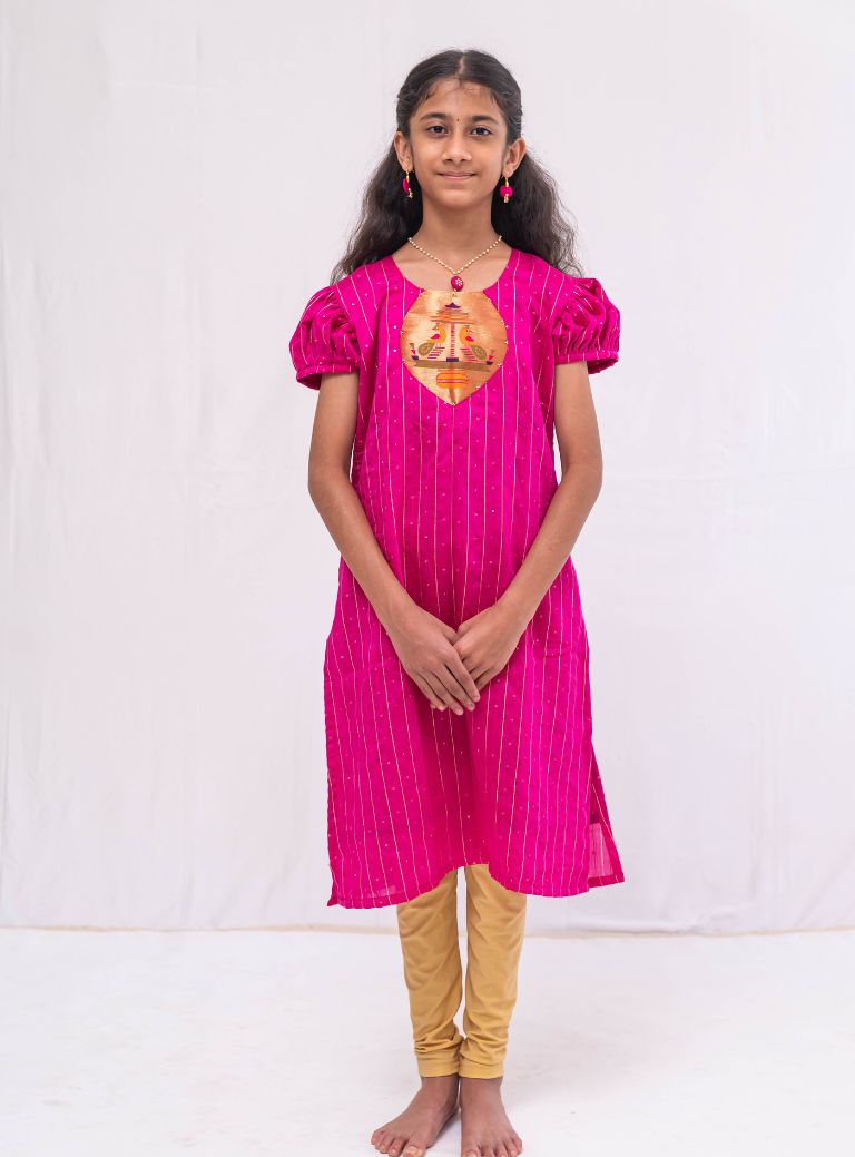 Dark Pink satin chanderi sequined, puff sleeved kurti with paithani yoke pattern for Girls.Let your princess be as comfortable as in her casuals with carefully designed & crafted Comfort Ethnic Wear by Soyara Ethnics.Keep her fashion quotient high with timeless patterns, vibrant combinations and royal textiles.