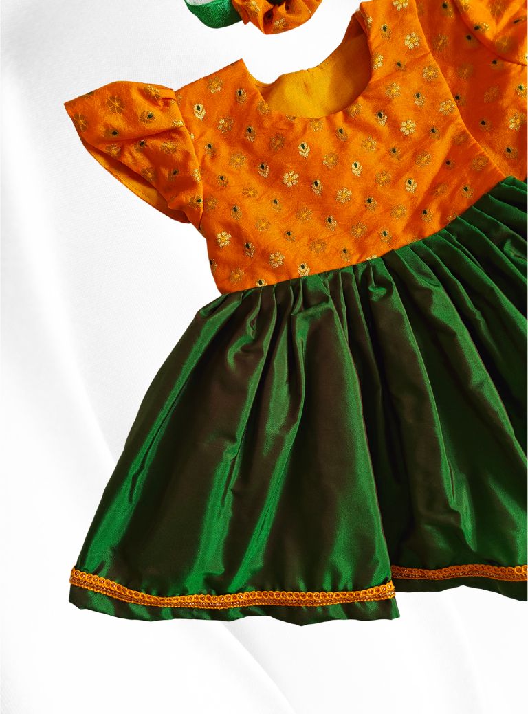 Yellow brocade with bottle green  silk front open flared newborn baby girl frock for naming ceremony with bonnet,bloomer & booties.It's the perfect outfit for your naamkaran or annaprashan ceremony.Traditional dress for Noolukettu Ceremony,Pachavi Puja,cradle ceremony,Rice Ceremony,Chatti Puja etc.Apt gifting idea 