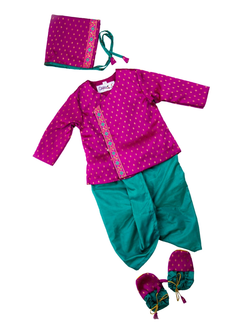 This Sharad Kurta and dhoti ensemble for baby boys features a soft brocade silk front-open kurta adorned with contrasting lace details, paired with a vibrant aqua green pooja silk dhoti. The set is completed with a matching bonnet and booties, offering a coordinated and elegant traditional outfit.