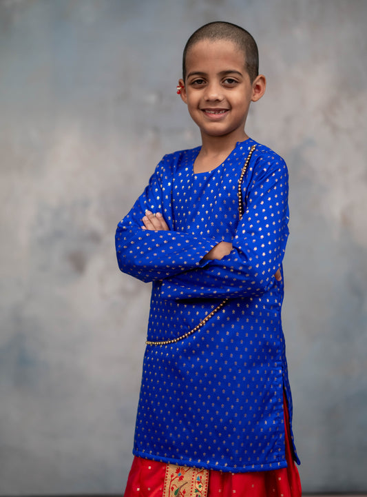 Royal blue brocade silk kurta with rounded overlap pattern embellished with golden beads for Batu.Pre-stitched sovale uparane set includes Ready to wear Sovale & Uparane/Upavastra.Can be paired with a short kurta.This Set is ideal for rituals like Matrubhojan,Muhurt during Munj/Upanayan/Vratabandha/Thread Ceremony.