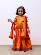 Turmeric Yellow Raw silk Ghagra choli with burning red fulkari embroidered border at the bottom and sleeves for Girls