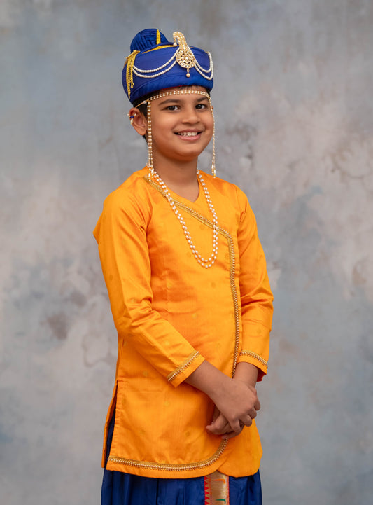 Mango coloured cotton silk big jari butta front open short kurta with pearls embellished lace highlights defining the curve and around cuffs for Batu.Kurta is ideal for rituals like Matrubhojan,Muhurt during Munj/Upanayan/Vratabandha/Thread Ceremony.