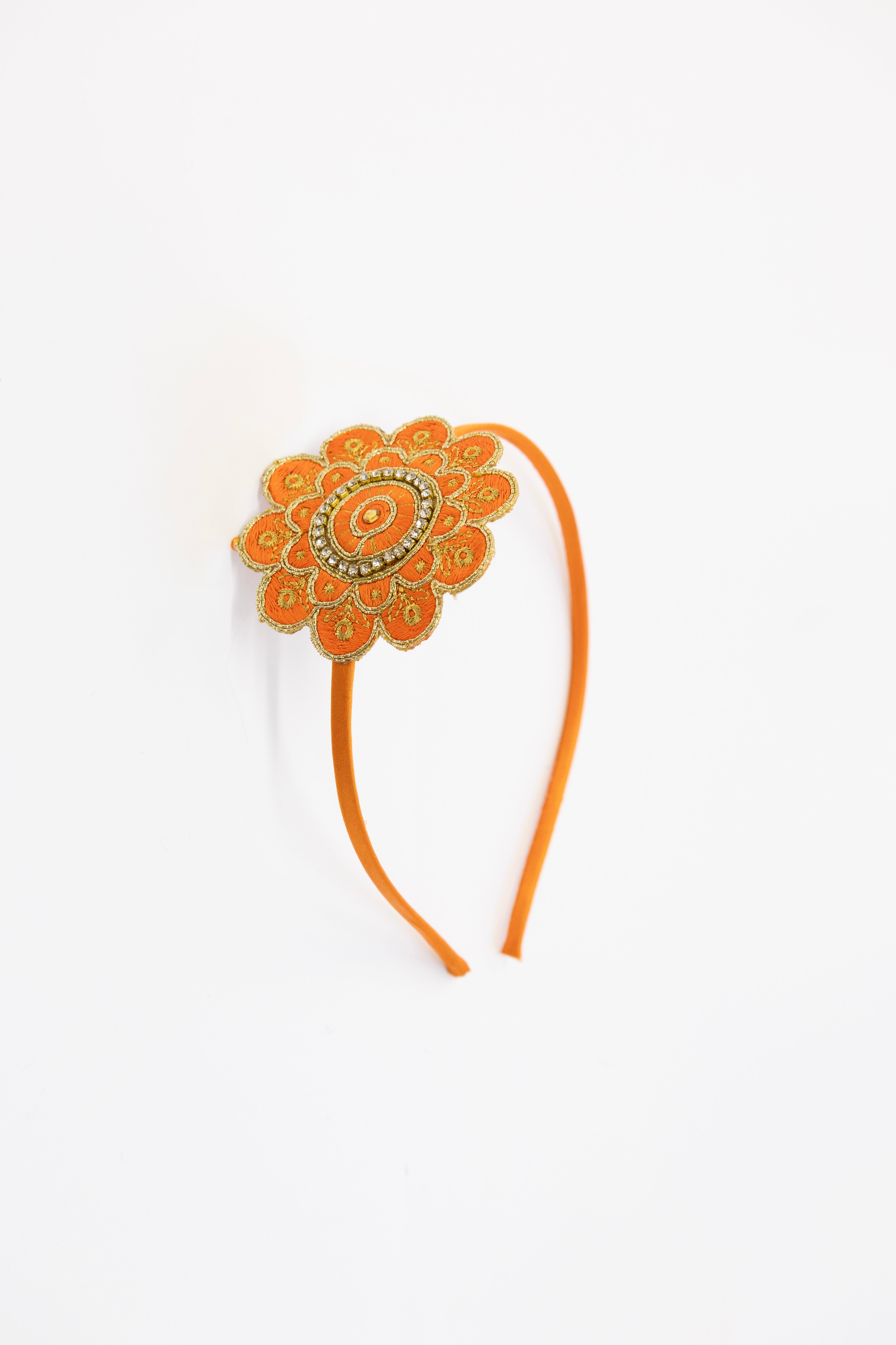 Orange Embroidered and stone embellished flower shaped hairband for Girls