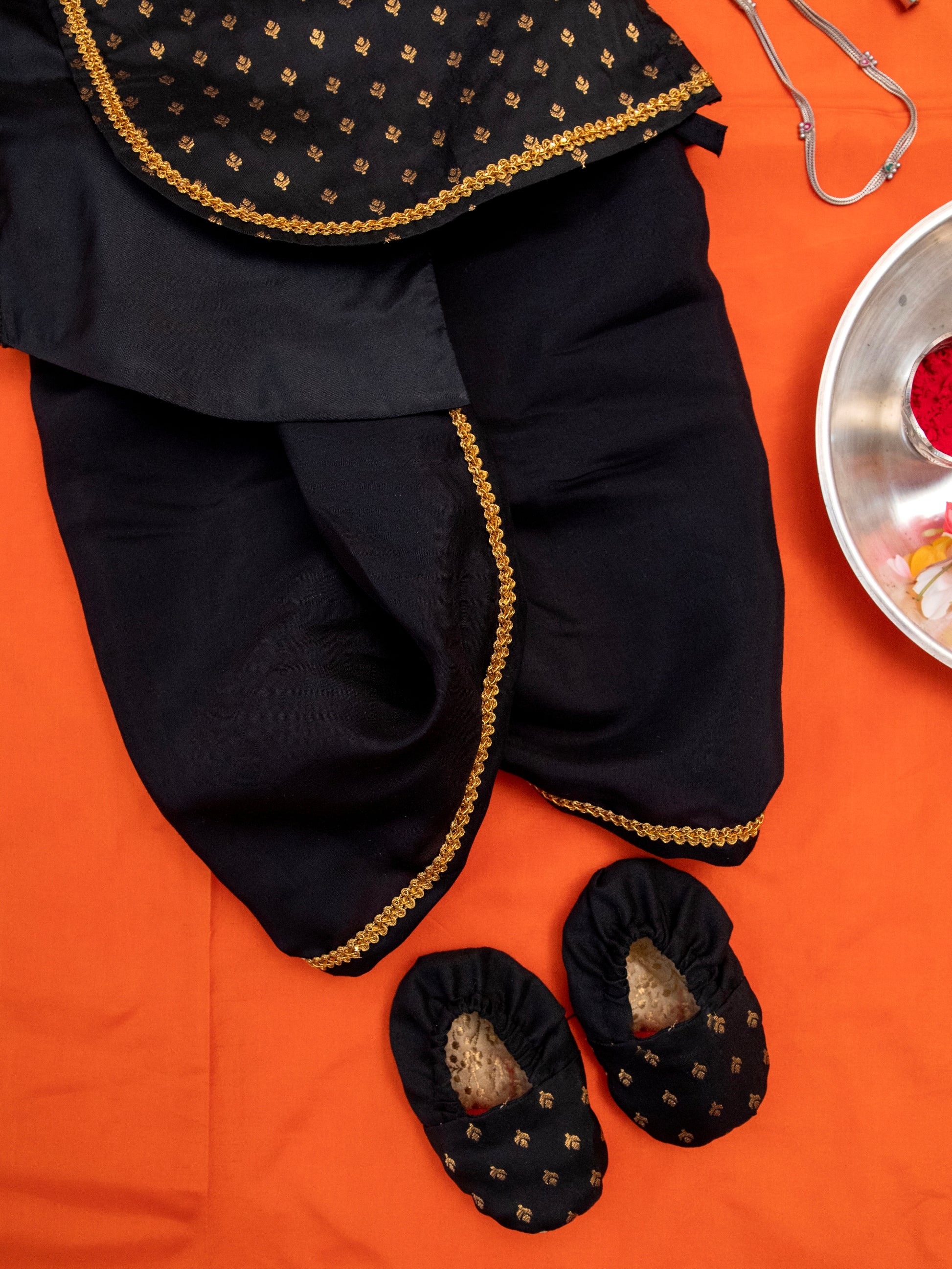 Black Brocade Dhoti Kurta Set for a newborn baby boy,includes black cotton silk dhoti,matching bonnet & booties.It's the perfect outfit for your baby's naming ceremony,naamkaran,annaprashan ceremony.Traditional dress for Noolukettu Ceremony,Pachavi Puja,cradle ceremony,Rice Ceremony,Chatti Puja etc. Apt gifting idea