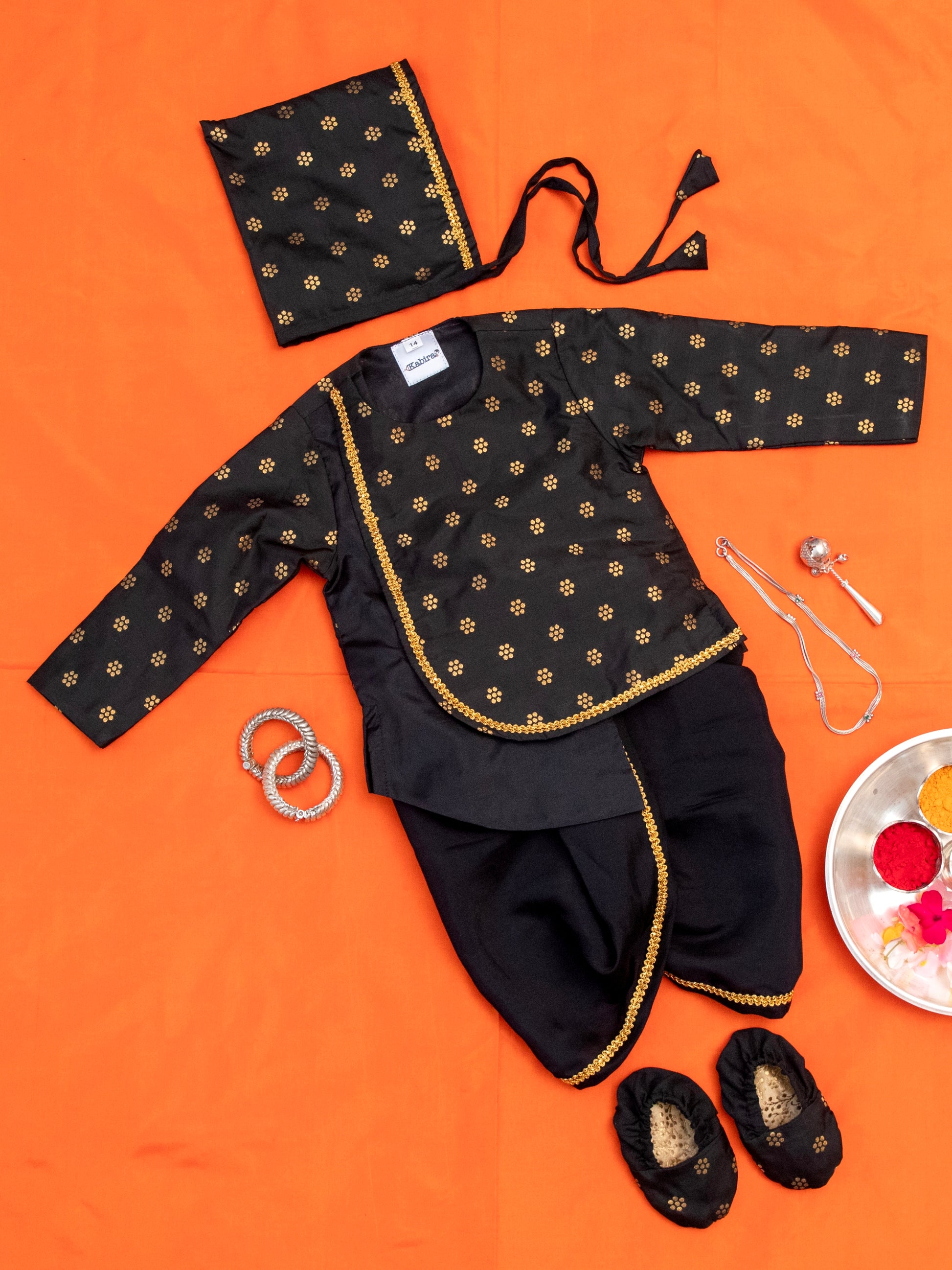 Black Brocade Dhoti Kurta Set for a newborn baby boy,includes black cotton silk dhoti,matching bonnet & booties.It's the perfect outfit for your baby's naming ceremony,naamkaran,annaprashan ceremony.Traditional dress for Noolukettu Ceremony,Pachavi Puja,cradle ceremony,Rice Ceremony,Chatti Puja etc. Apt gifting idea