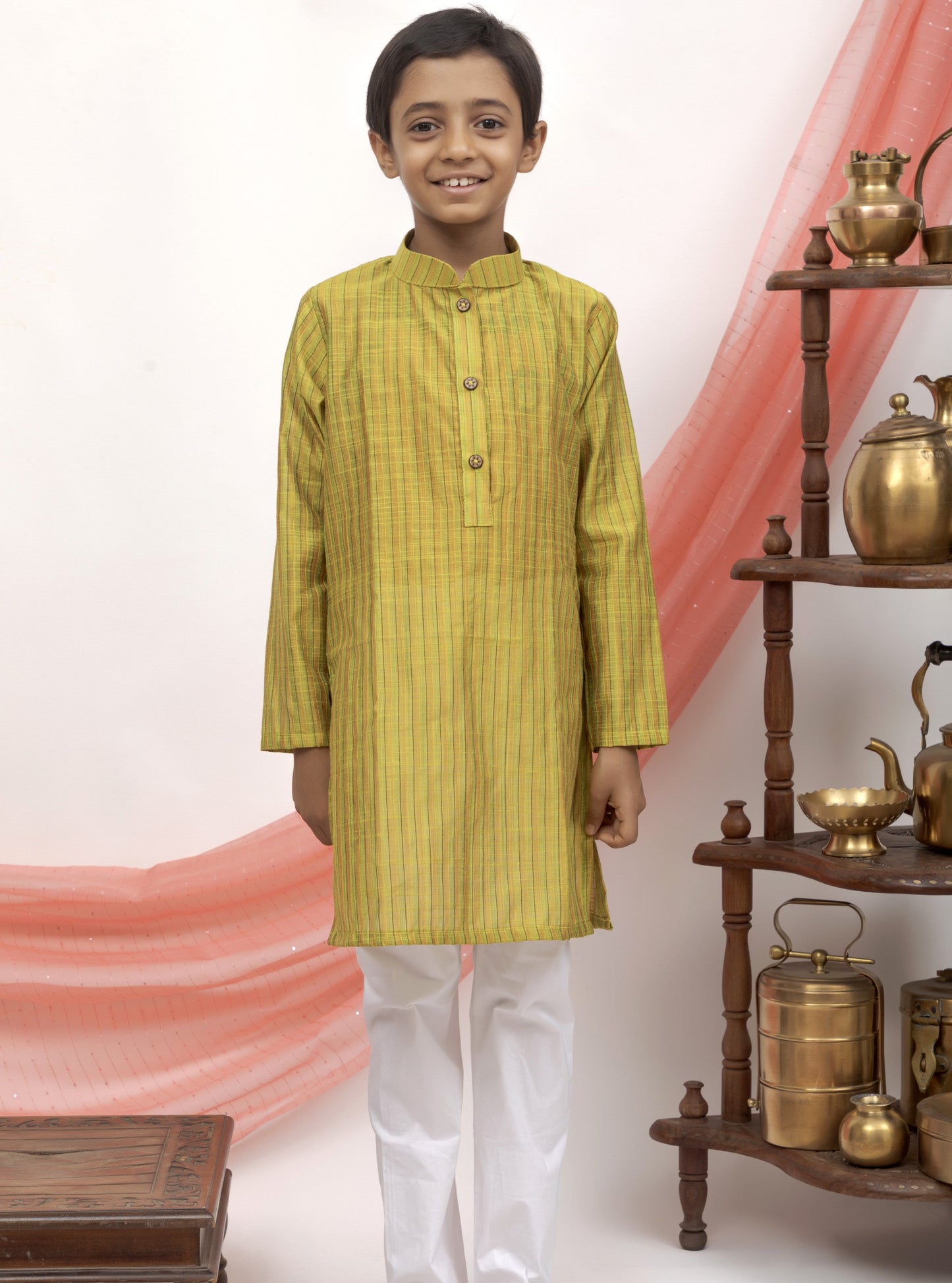 Olive Green Cotton silk striped regular stand collar kurta.Kurtas with collar or Angrakha pattern teamed with salwar are the best choice for any festive occasion for boys. They are Trendy, Easy to wear and comfortable to carry.