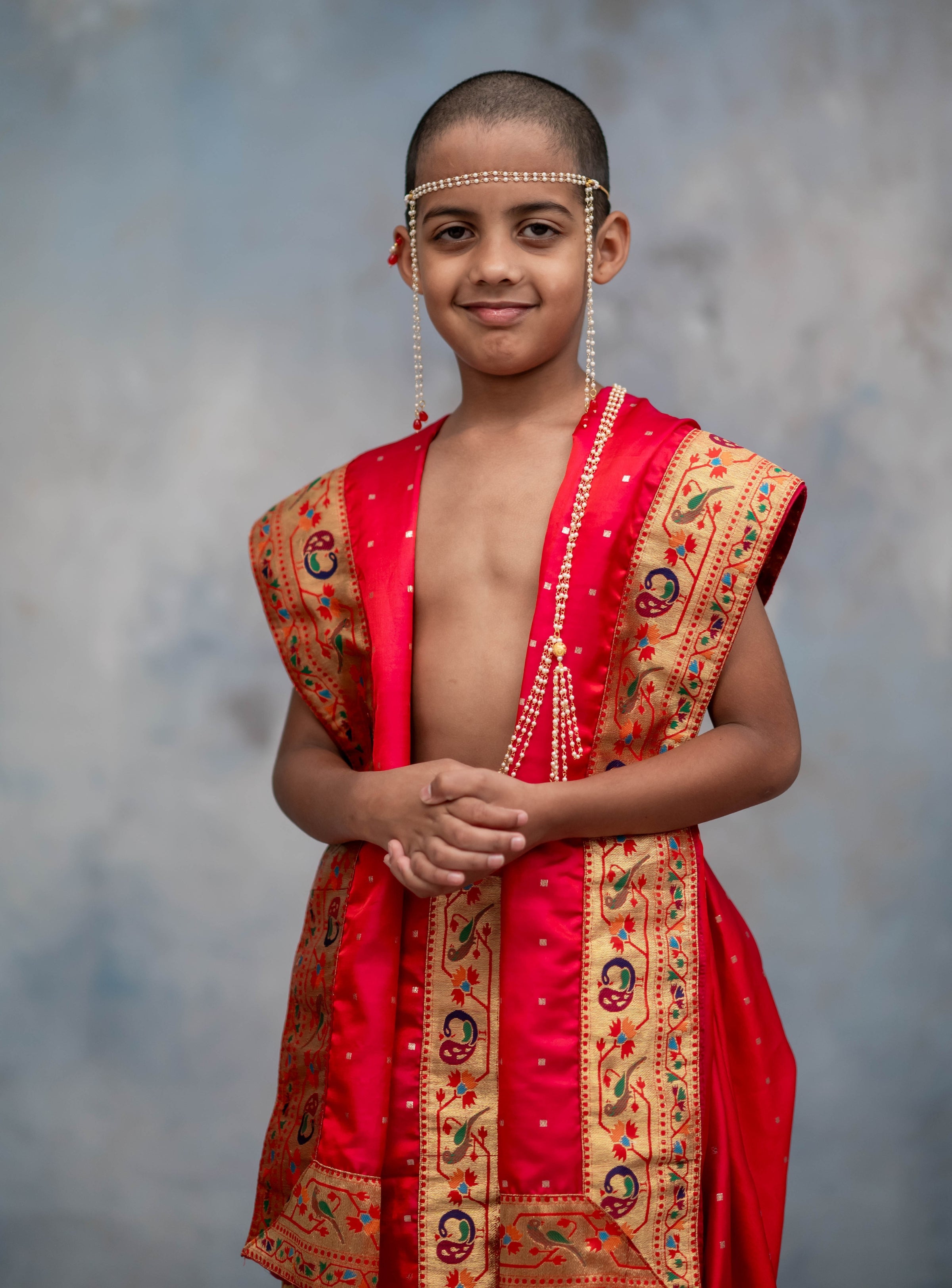Scarlet red satin taffeta silk  sovale uparane set with intricate parrot peacock paithani border for batu.Pre-stitched sovale uparane set includes Ready to wear Sovale & Uparane/Upavastra.Can be paired with a short kurta.This Set is ideal for rituals like Matrubhojan,Muhurt during Munj/Upanayan/Vratabandha/Thread Ceremony.